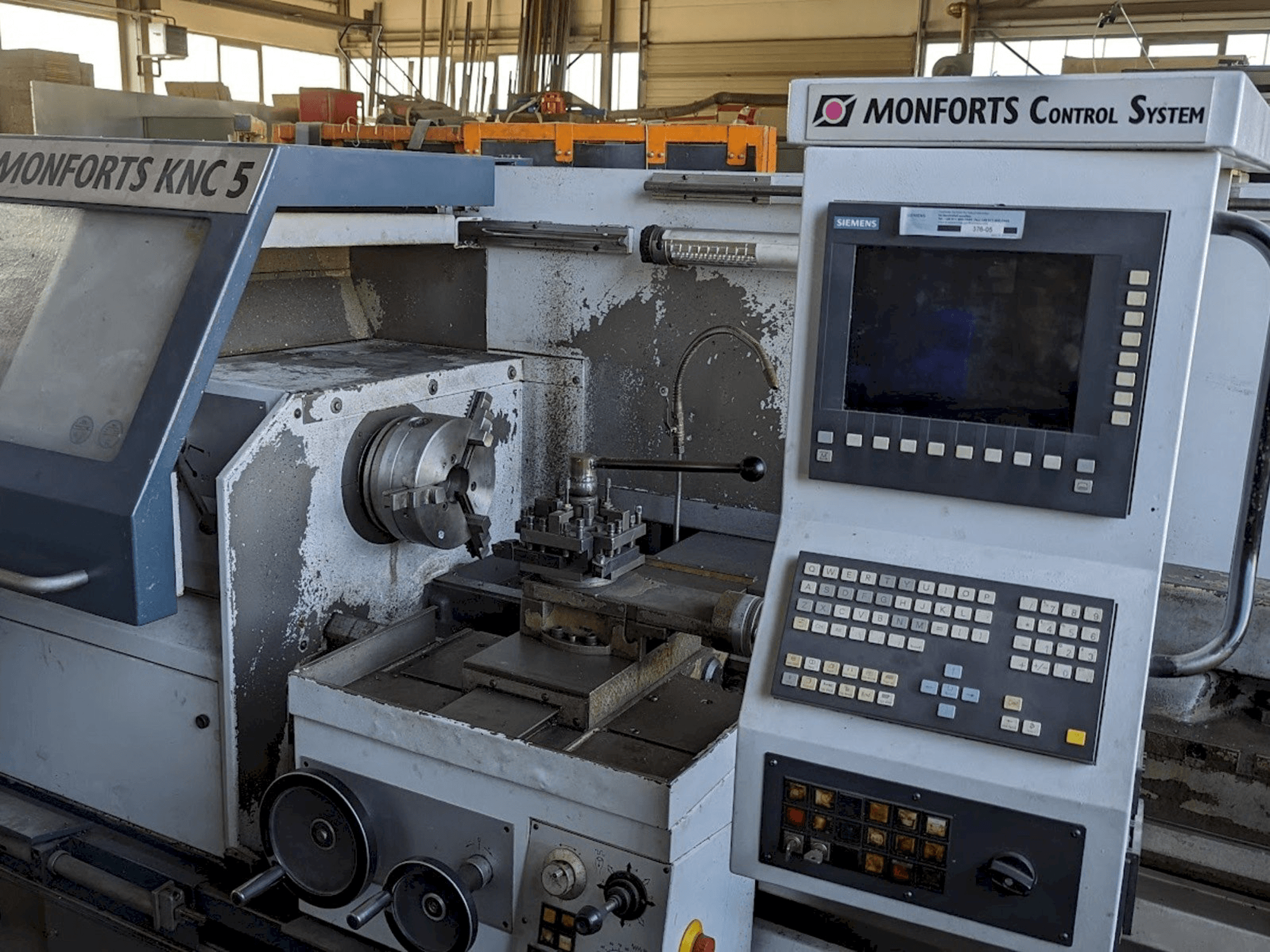 Vooraanzicht van Monforts KNC 5 machine