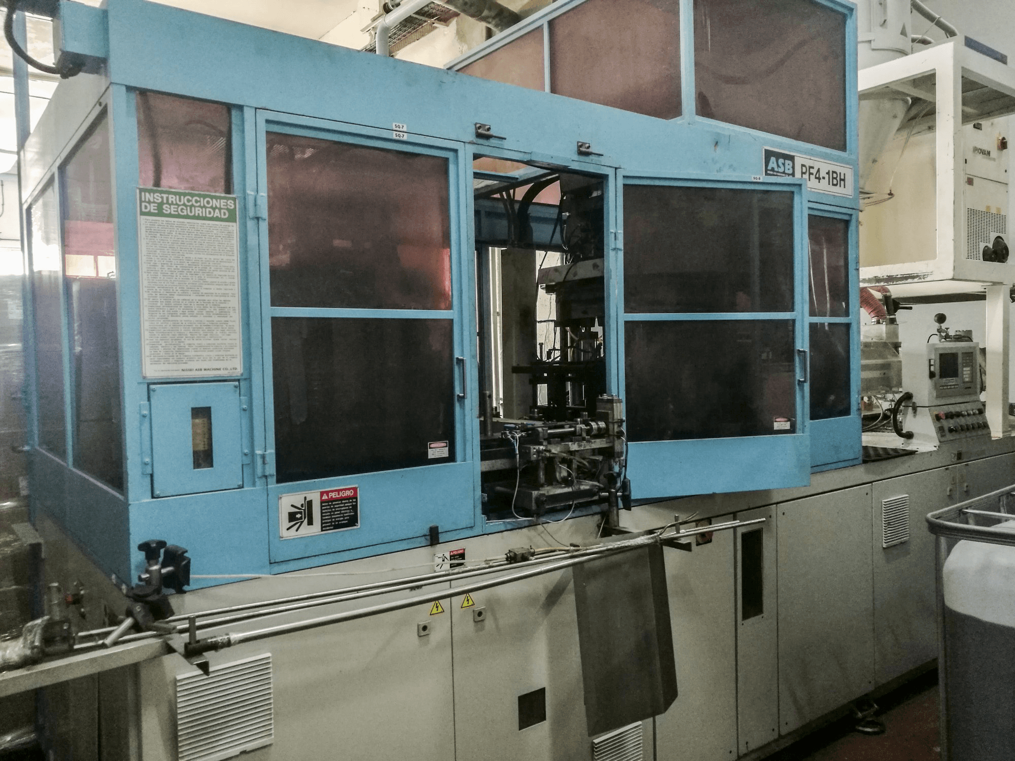 Links zicht van NISSEI ASB PF4-1BH machine