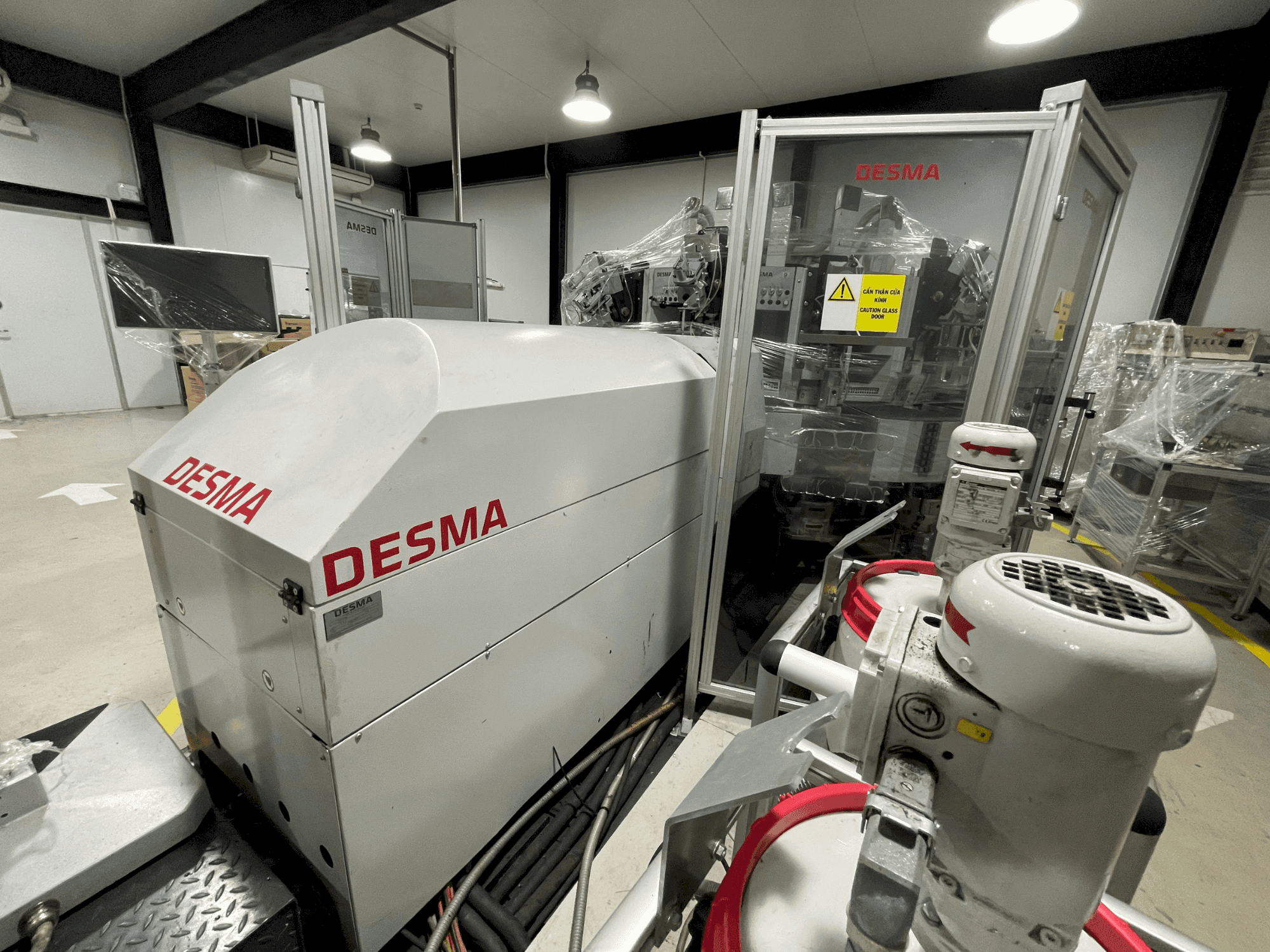 Vooraanzicht van Kloeckner Desma PU D522/12-LDI machine