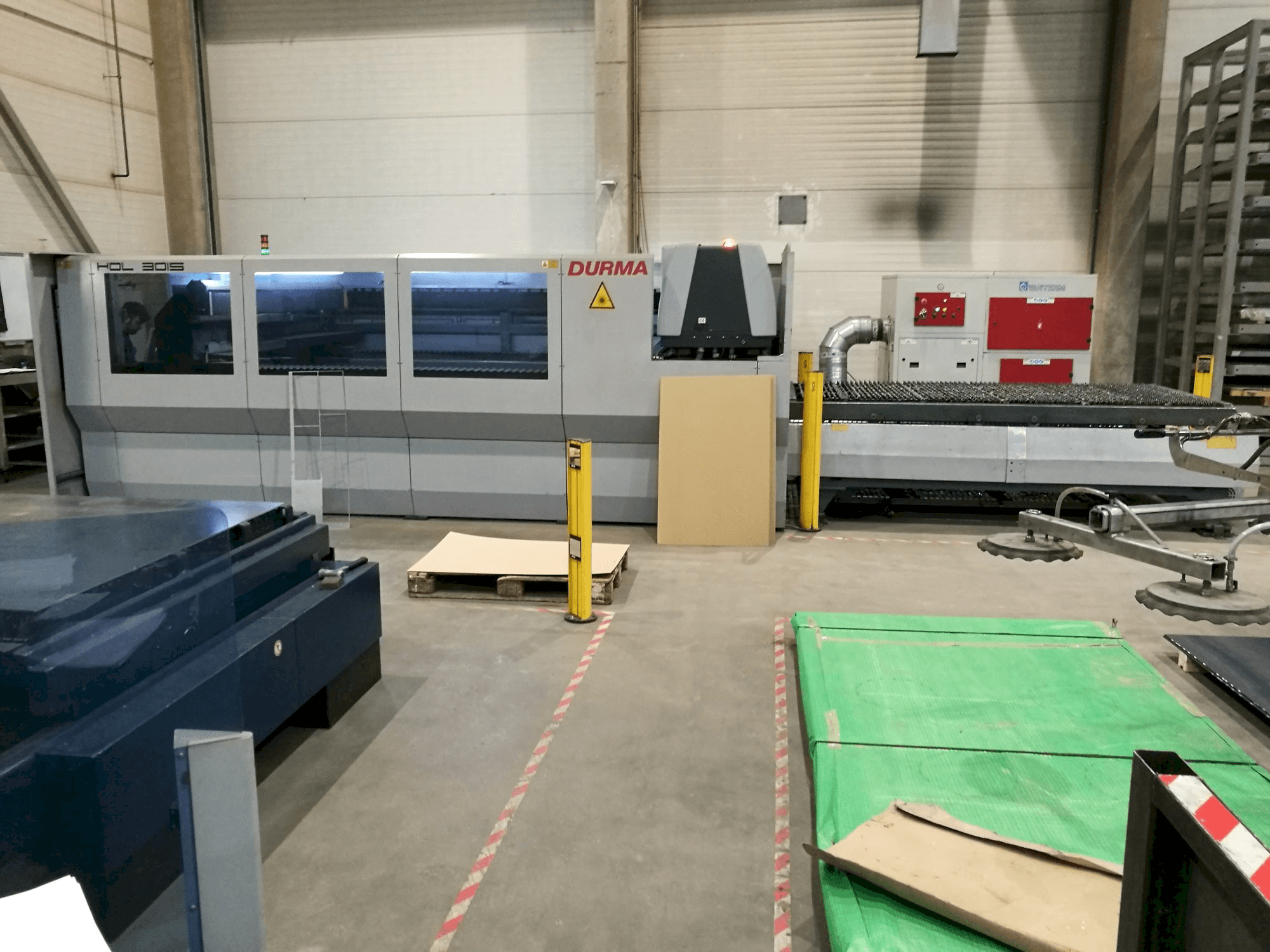 Vooraanzicht van Durma KISA KONVEYOR HDL 3015 machine