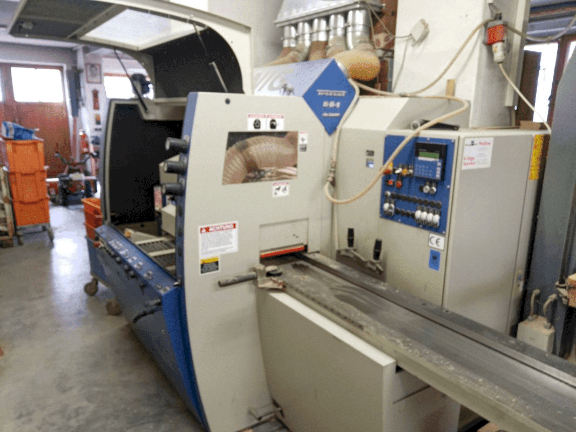 Vooraanzicht van WEINIG / DIMTER Unimat 500 machine