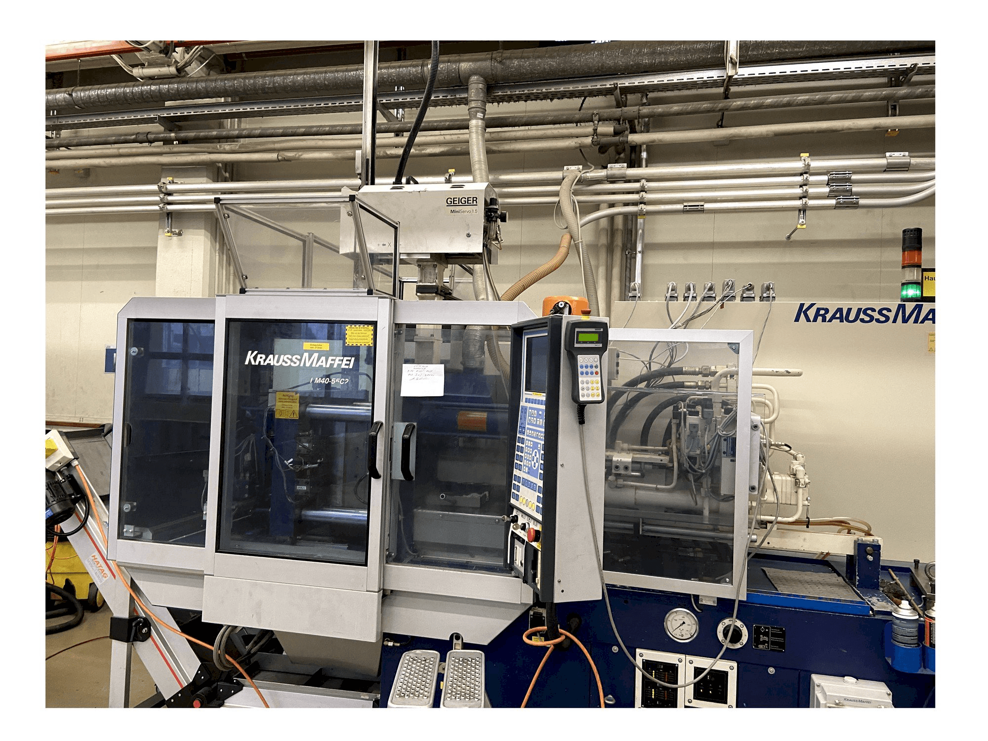 Vooraanzicht van Krauss Maffei 40-55 C2 machine