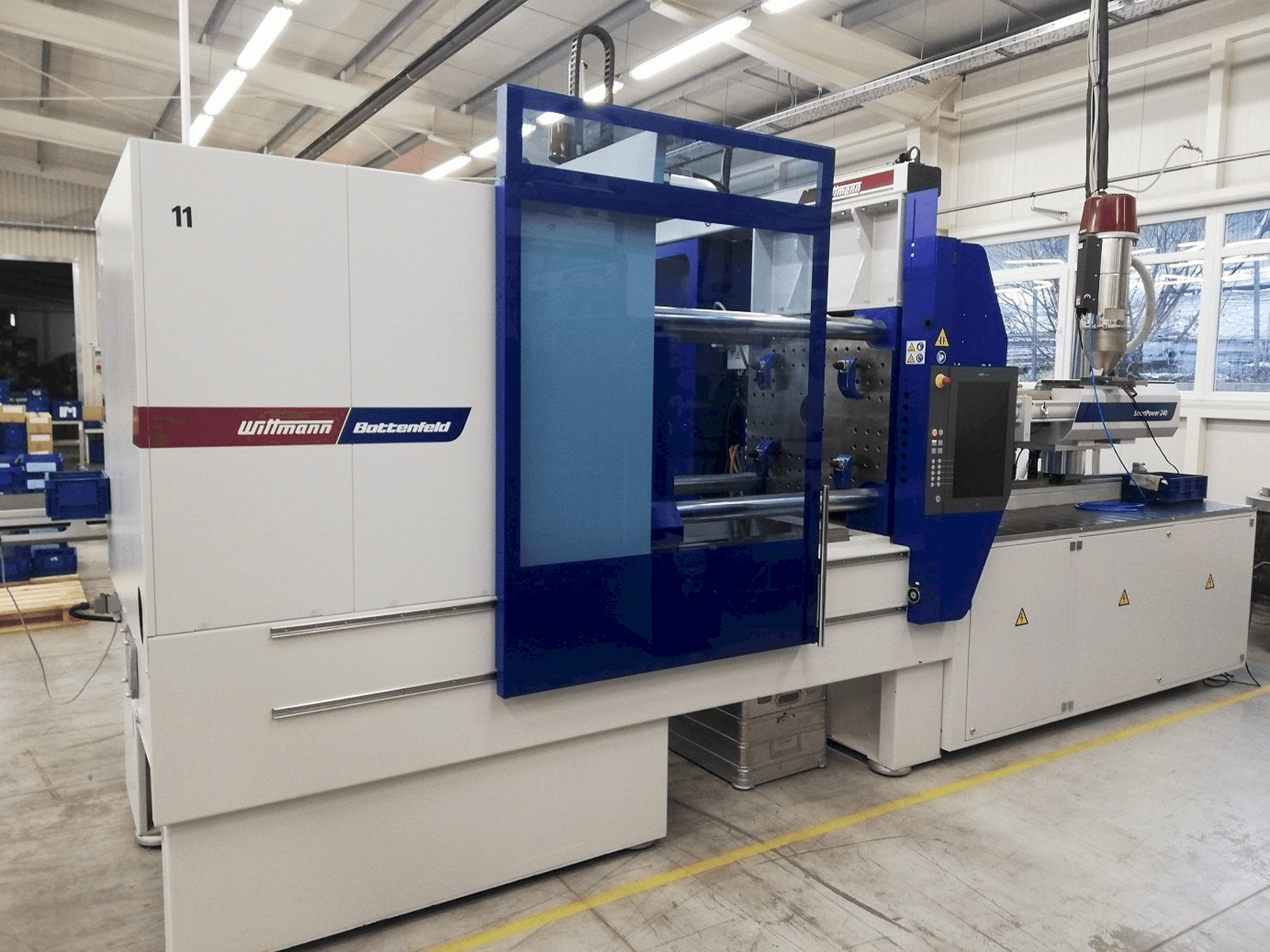 Vooraanzicht van Battenfeld ECO Power 180/750 machine