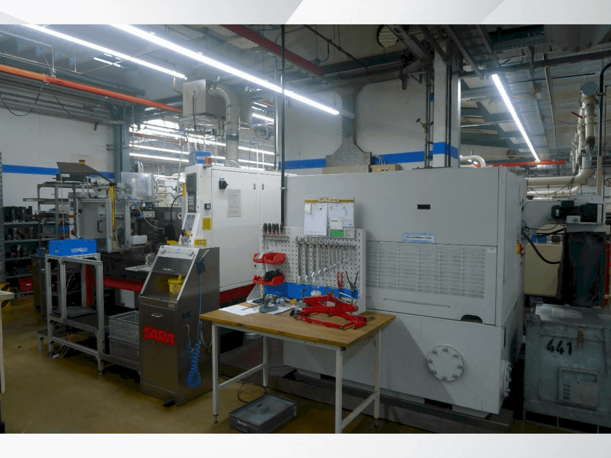 Zijaanzicht van TSCHUDIN ecoLine 400 machine