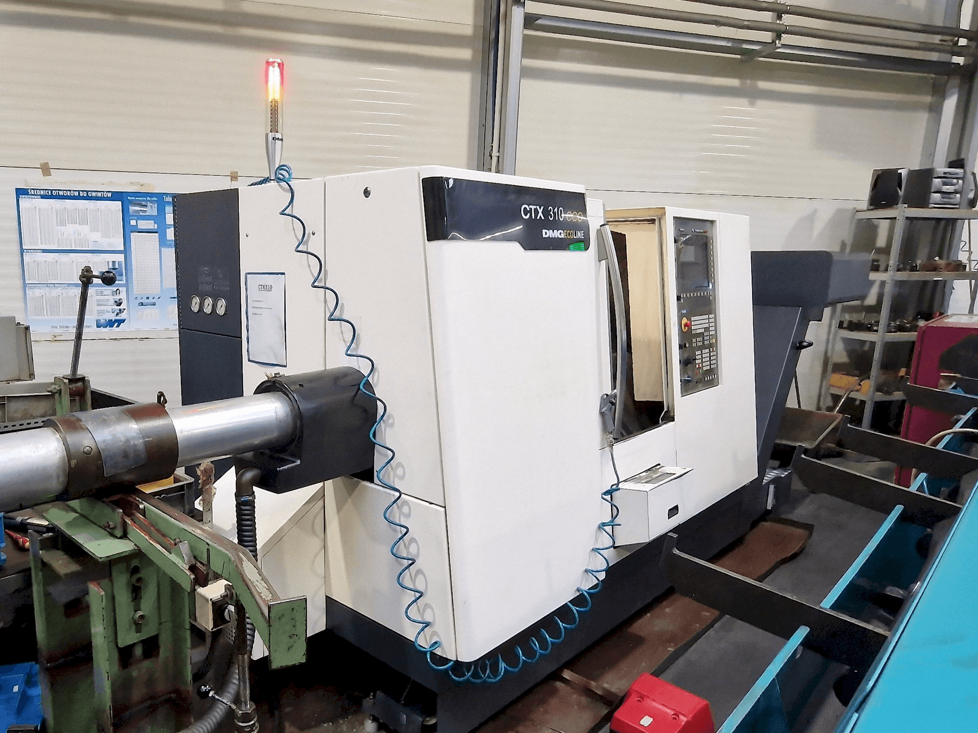 Linkerzijdeaanzicht van DMG CTX 310 ecoline machine