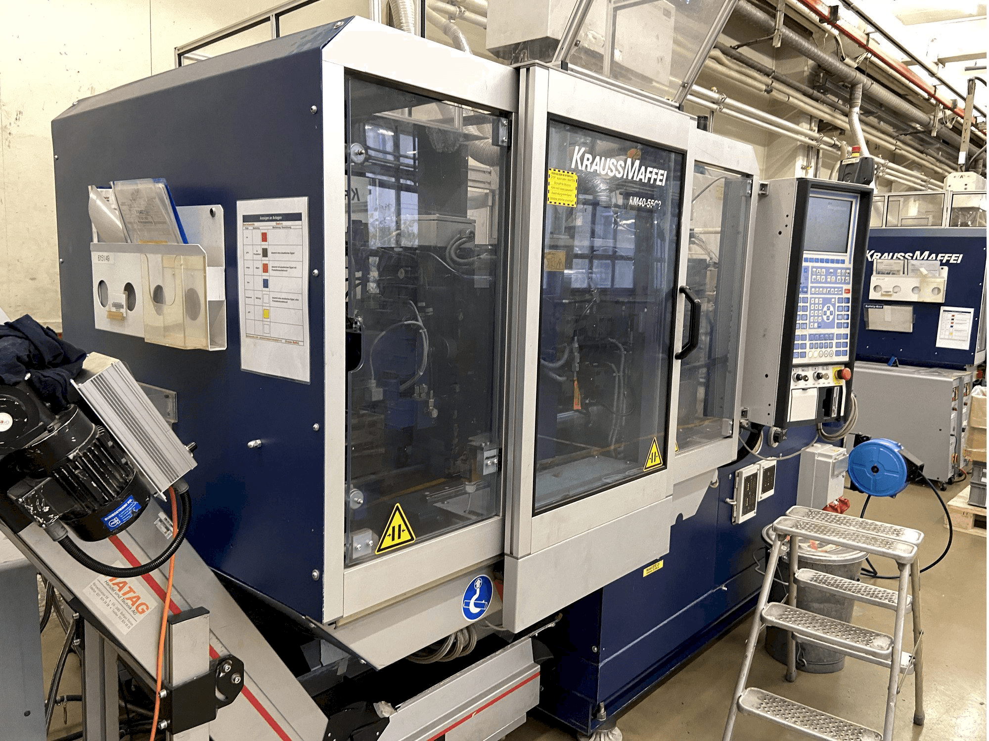 Vooraanzicht van Krauss Maffei 40-55 C2 machine