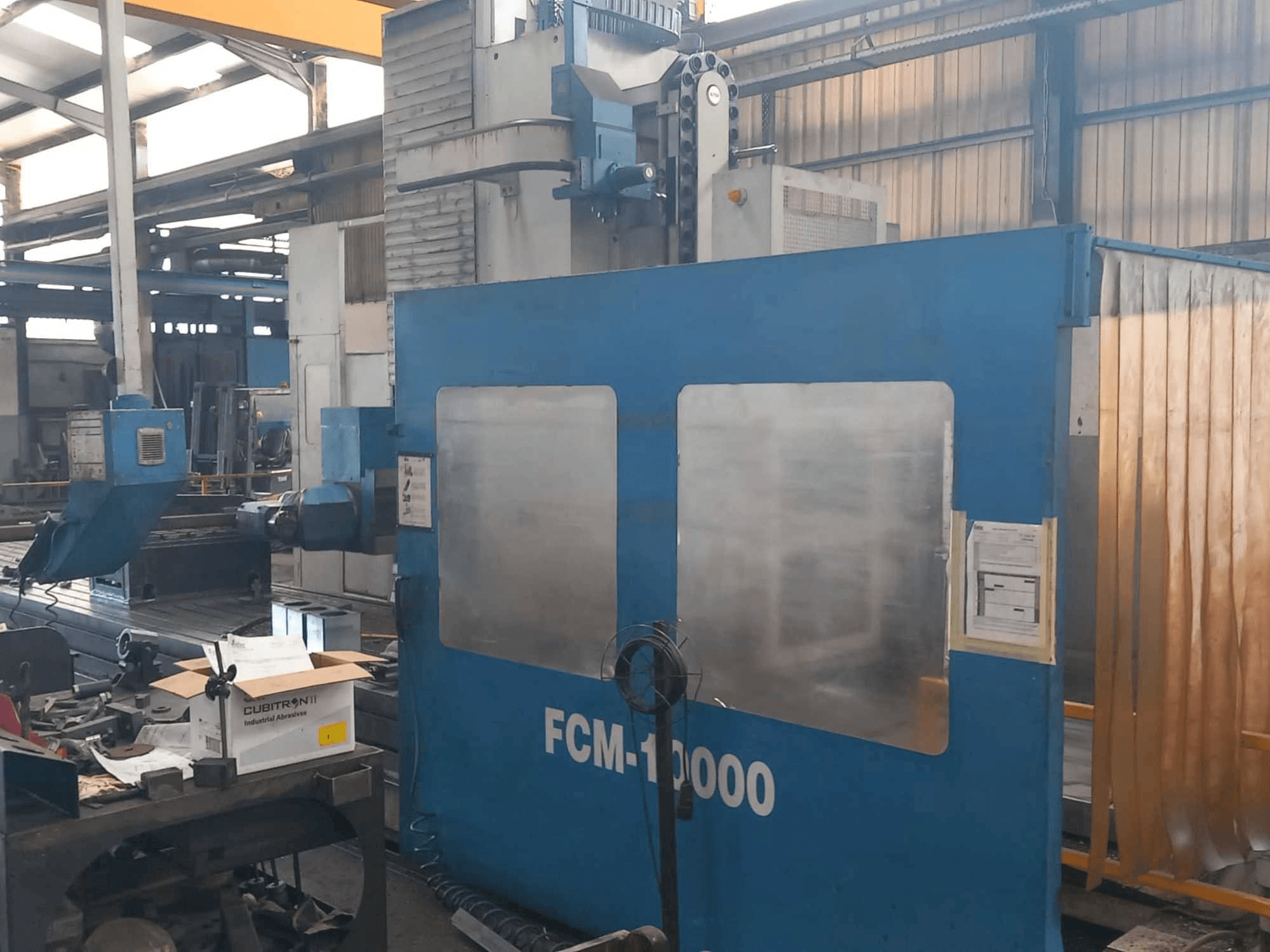 Vooraanzicht van CME FCM-10000 machine