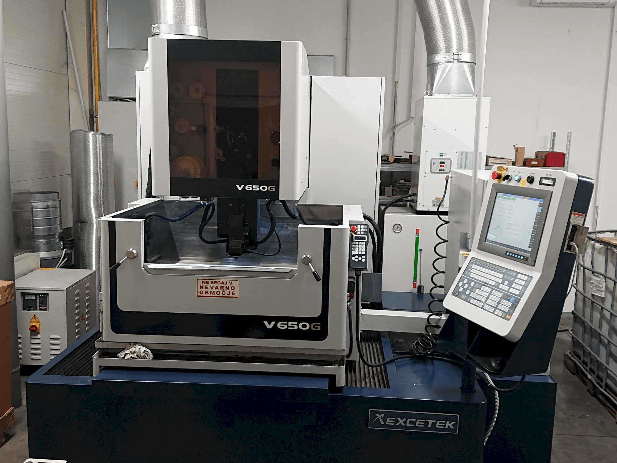 Vooraanzicht van EXCETEK V650G machine