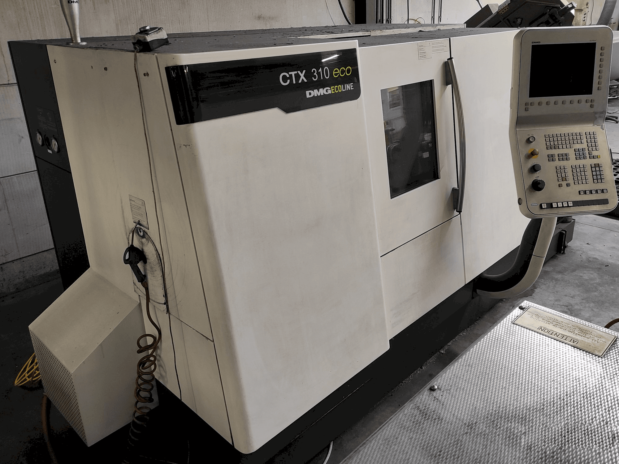 Vooraanzicht van DMG GILDEMEISTER ecoline CTX310 eco machine