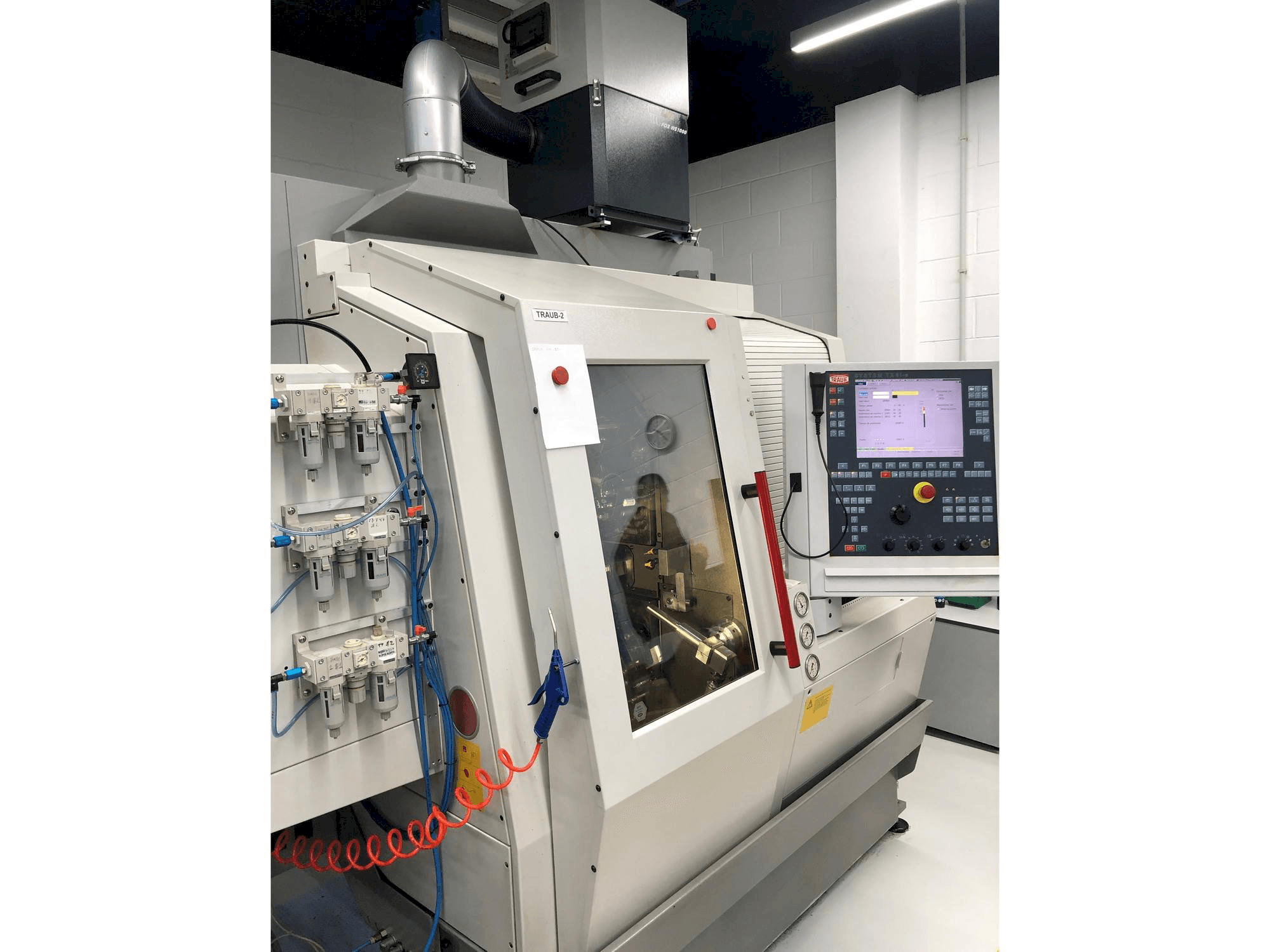 Linkerzijdeaanzicht van TRAUB TNL 18 machine