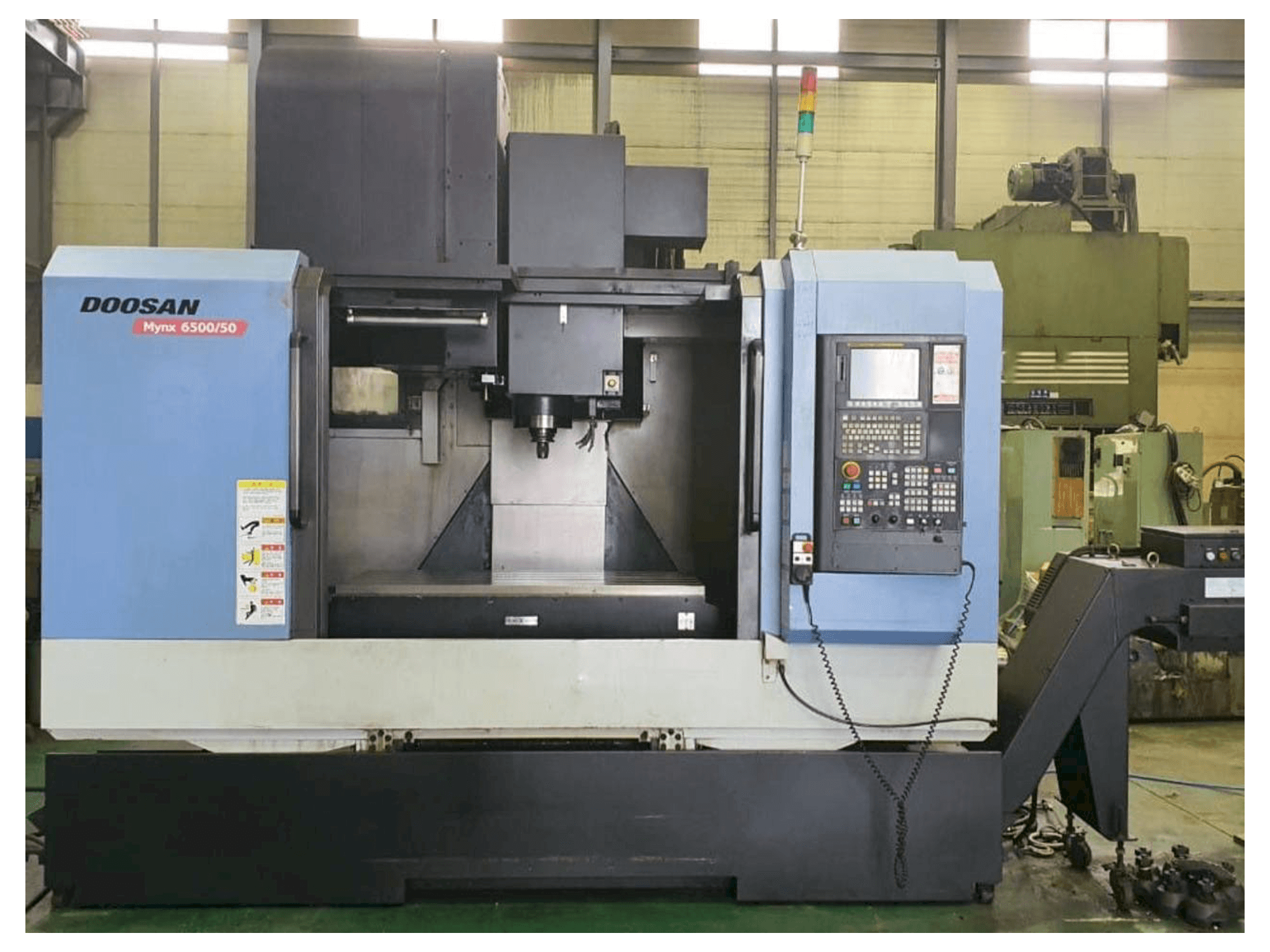 Vooraanzicht van Doosan Mynx 6500/50 machine