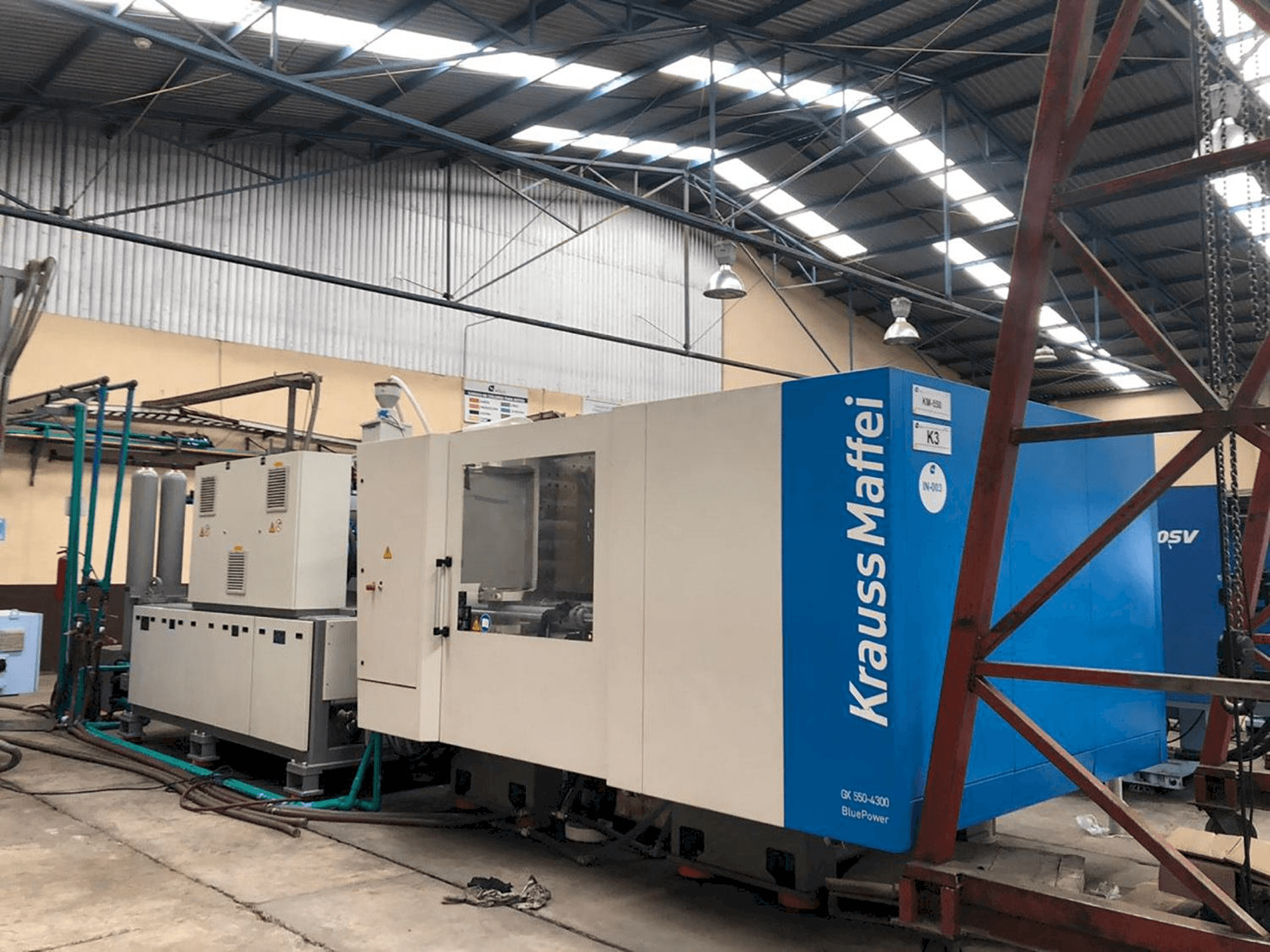 Vooraanzicht van Krauss Maffei 550-4300 GX machine