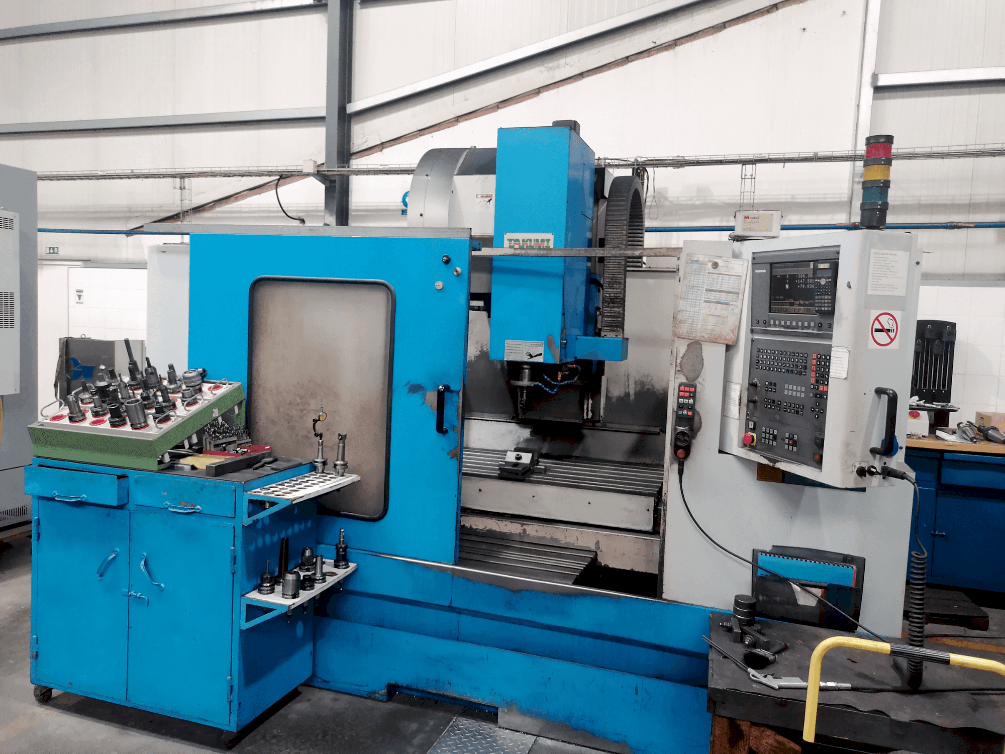 Vooraanzicht van Takumi V11 machine