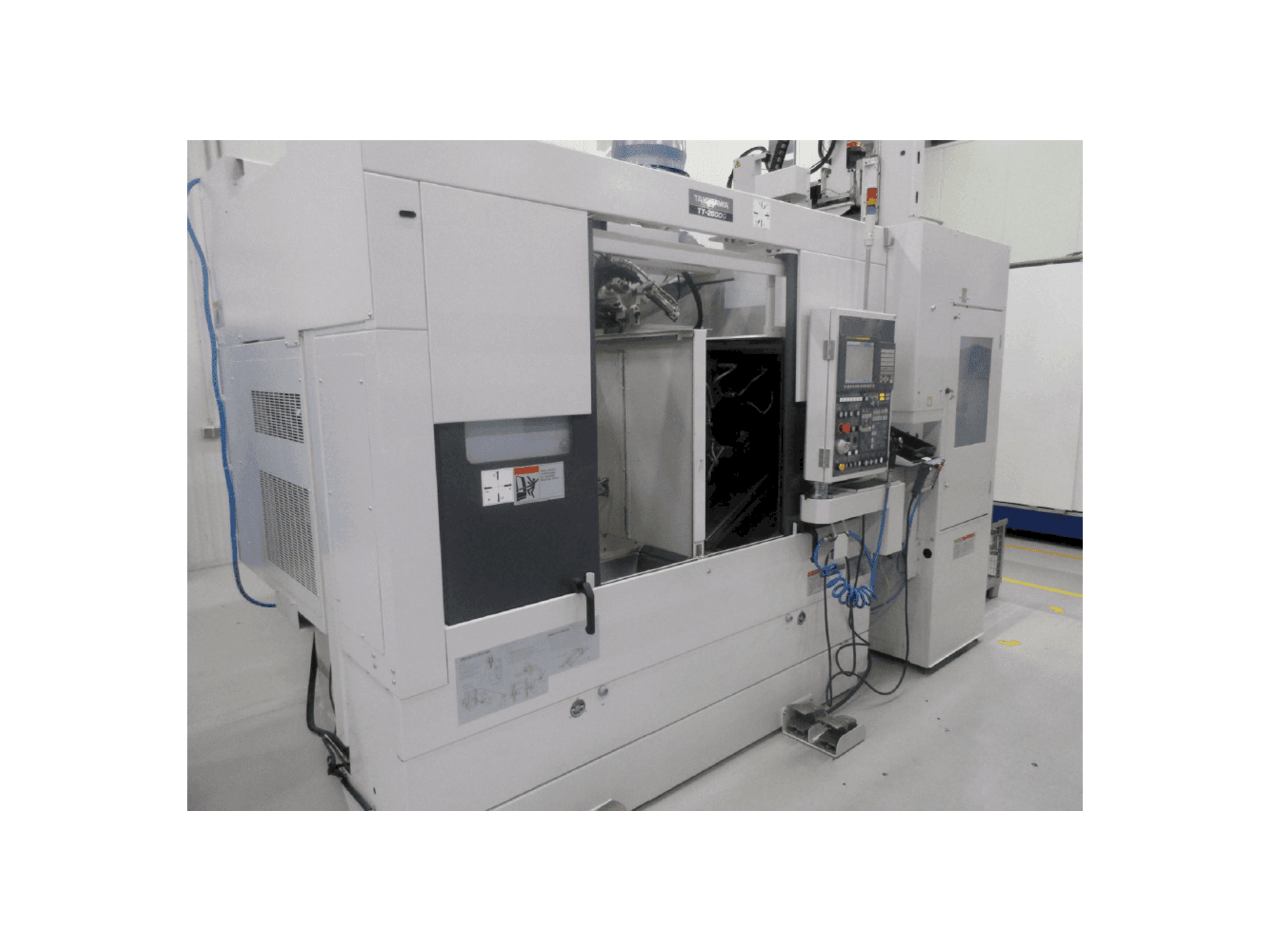 Vooraanzicht van Takisawa TT-2600G machine