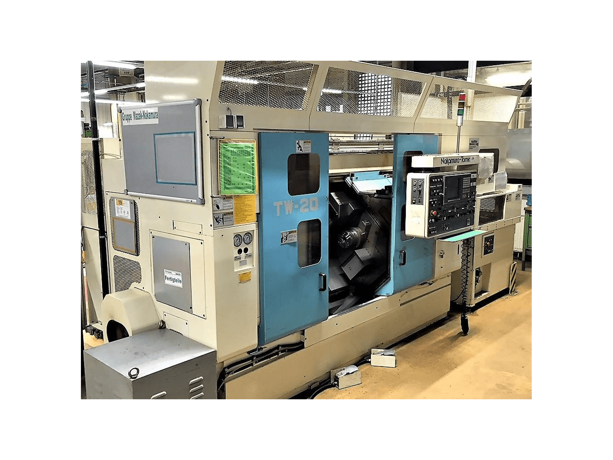 Links zicht van NAKAMURA-TOME TW-20 machine