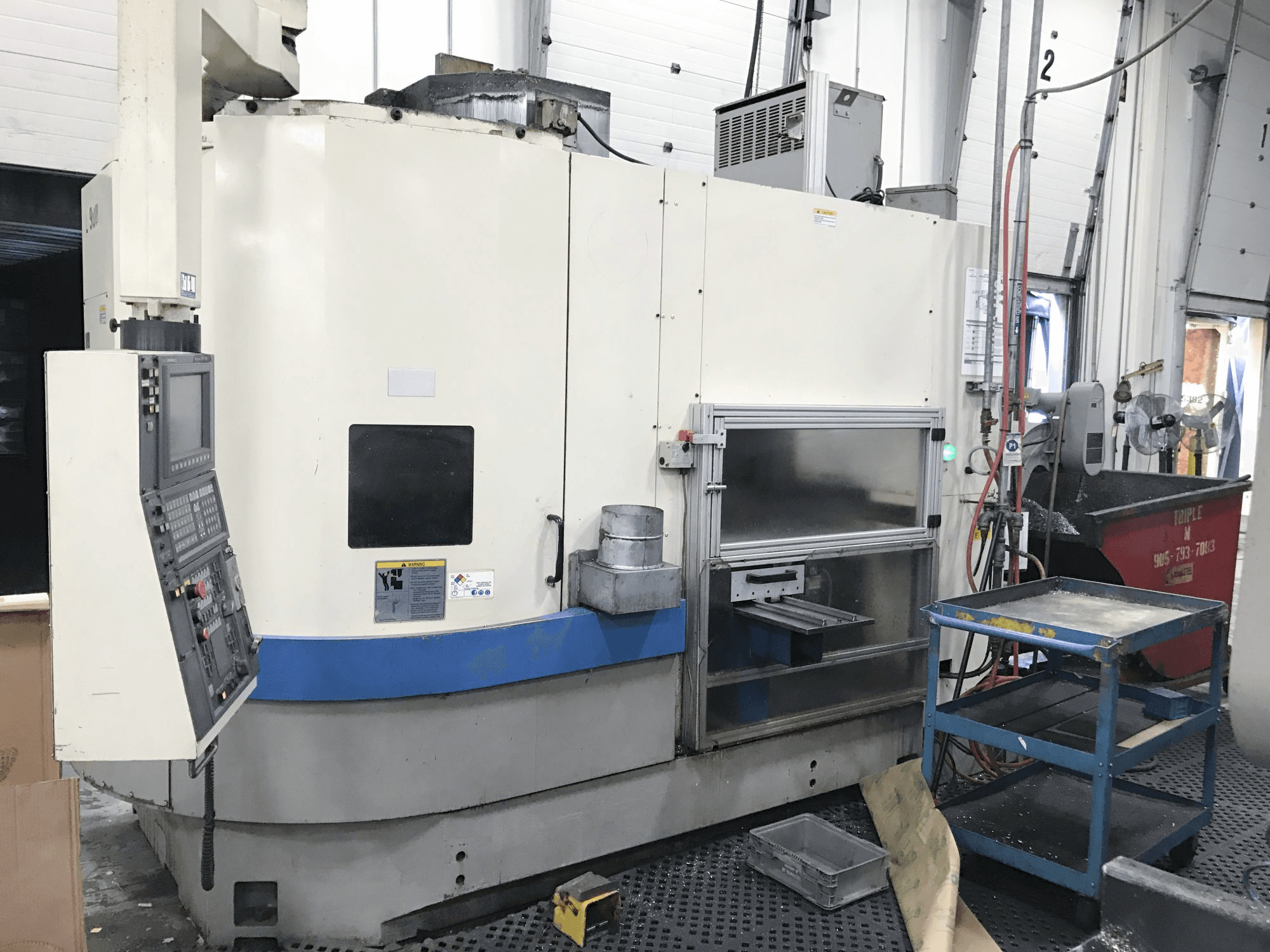 Links zicht van Okuma LVT 400 machine