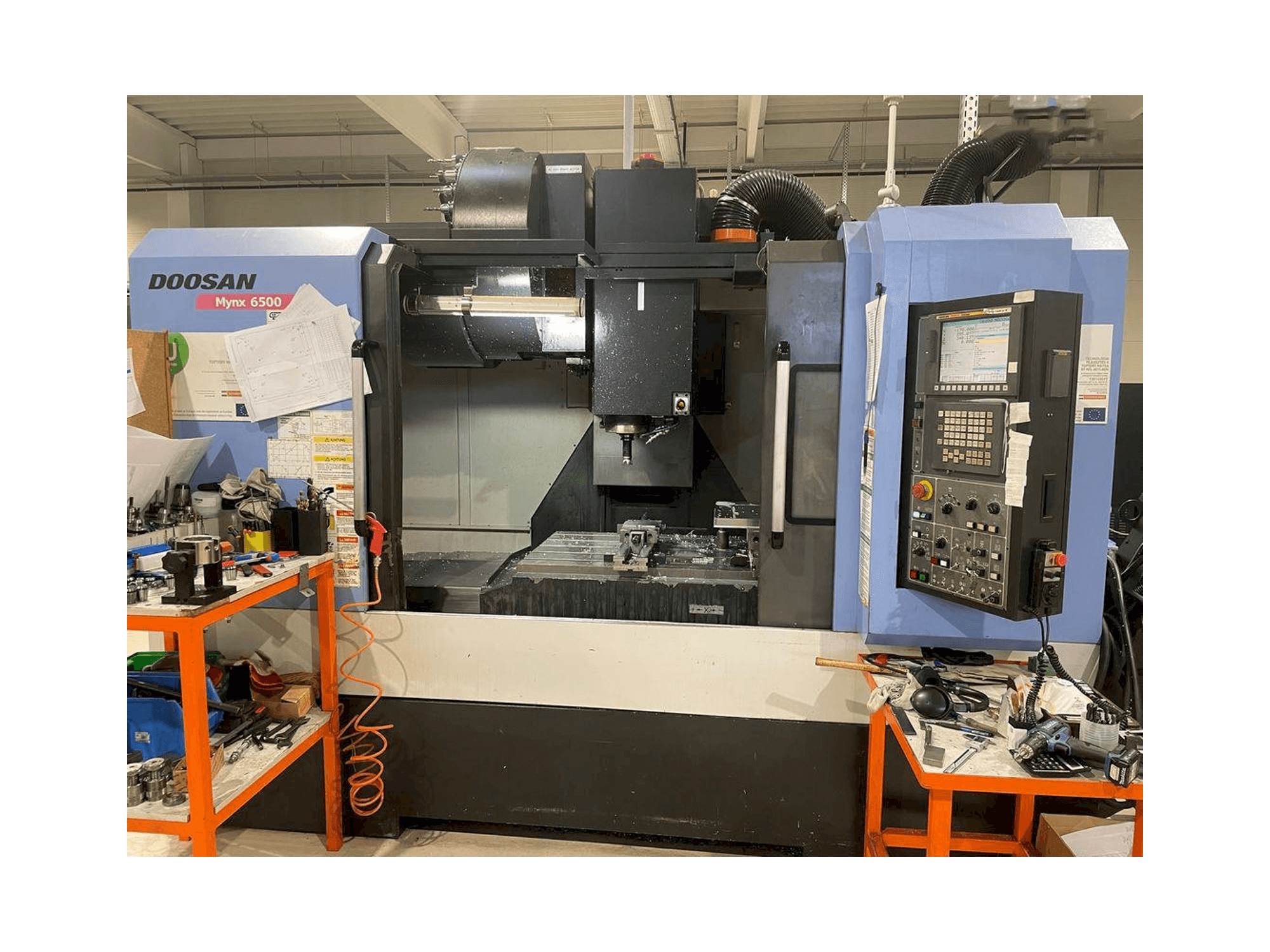 Vooraanzicht van Doosan MYNX DNM 6500 machine