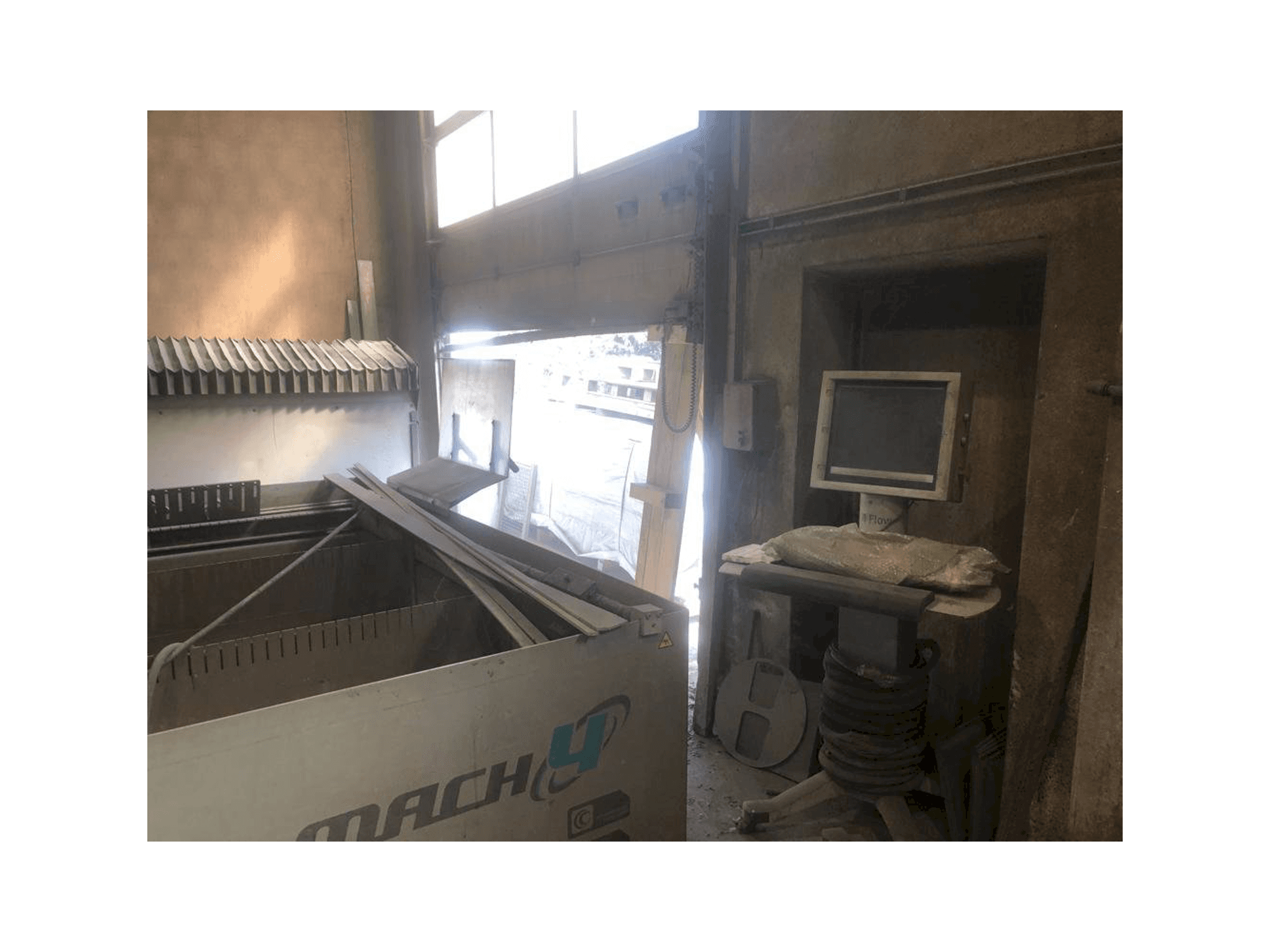 Linkerzijdeaanzicht van Flow Mach 4 3D machine