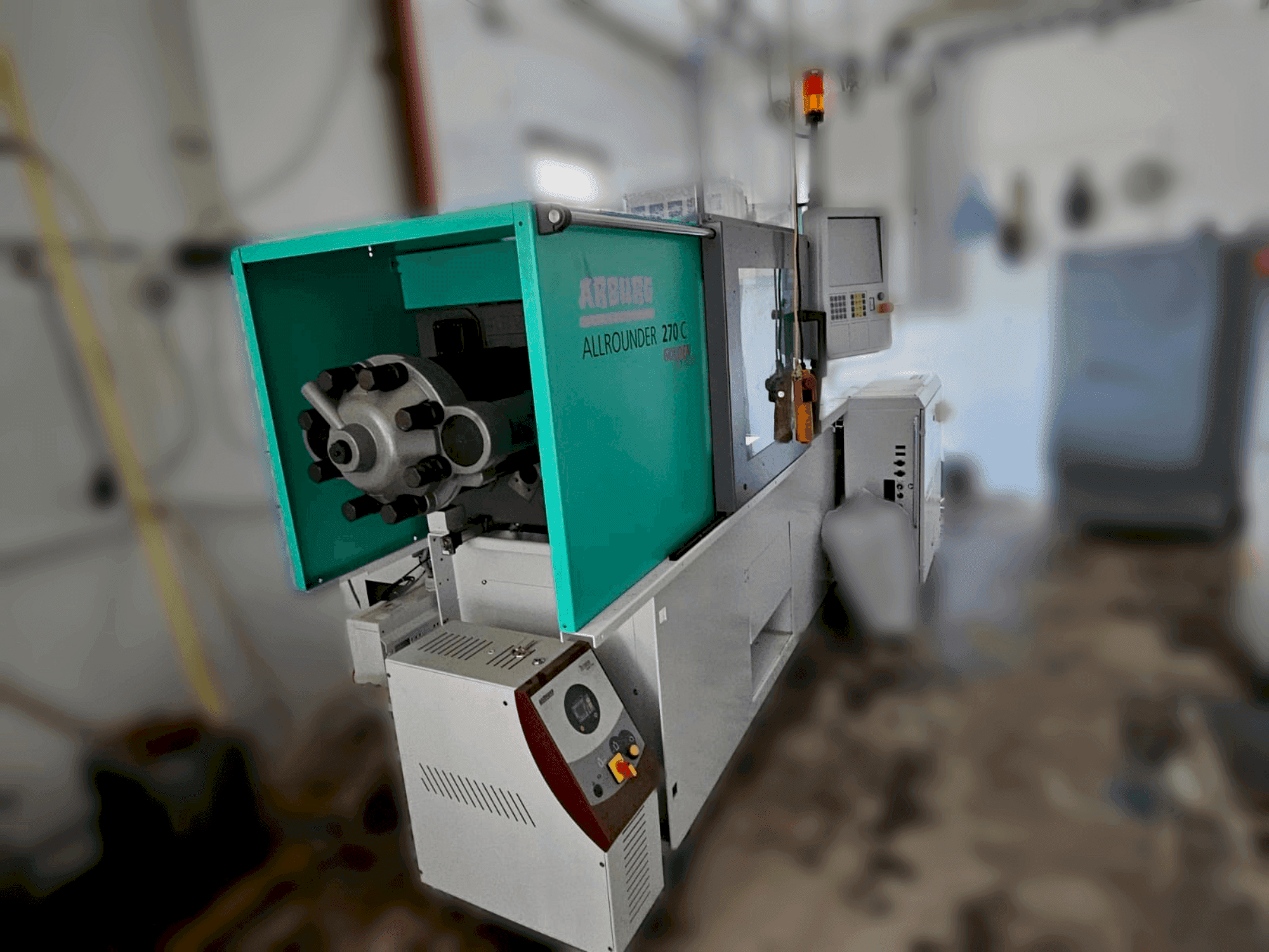 Zijaanzicht van Arburg 270 C 400-70 Golden Edition machine