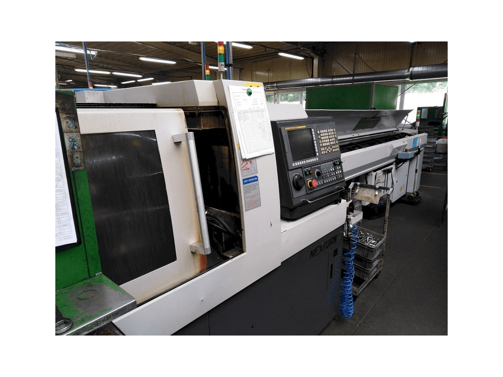 Vooraanzicht van Nexturn SA-20E machine