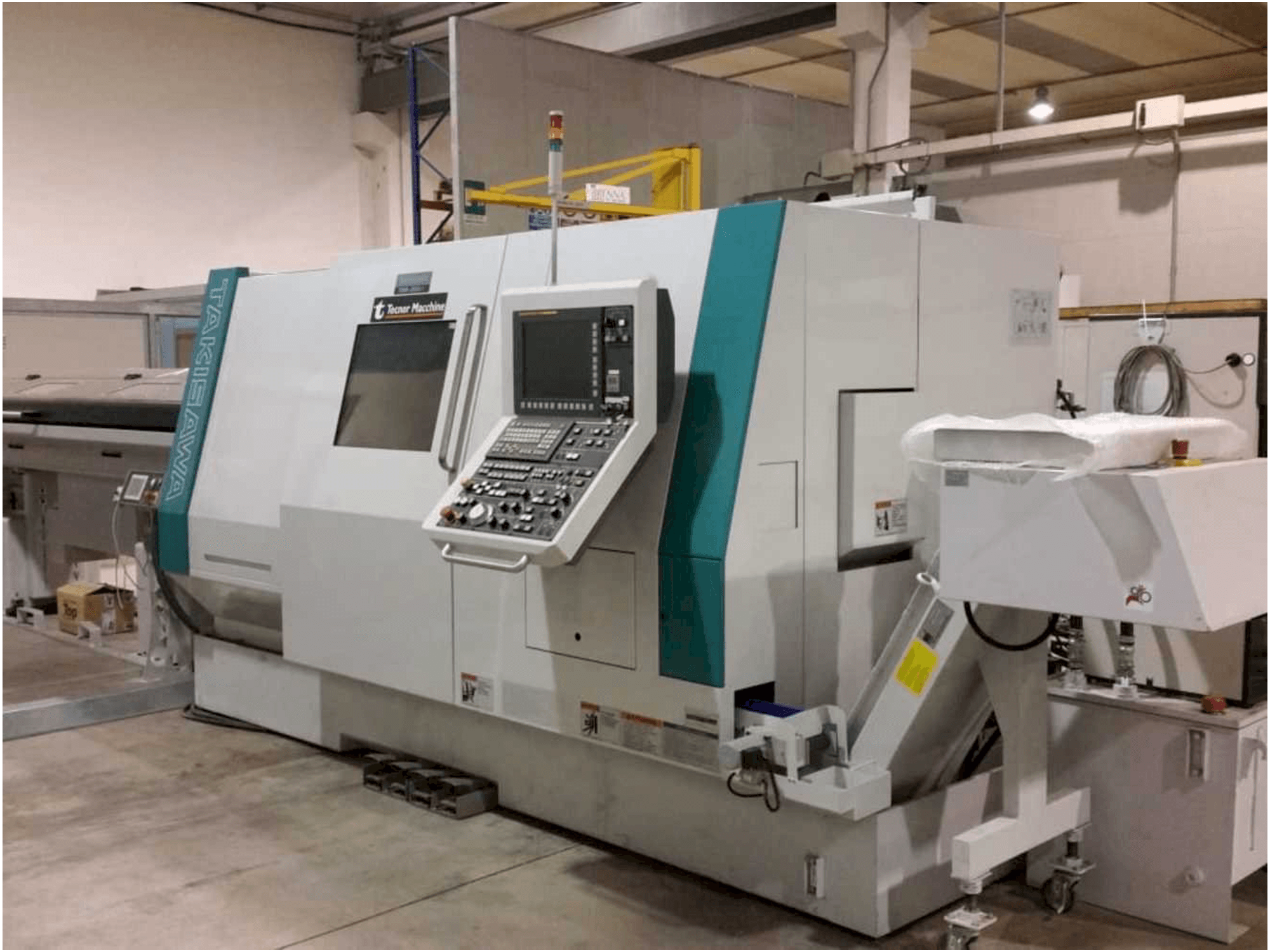 Vooraanzicht van Takisawa TMMY-250 M1 machine