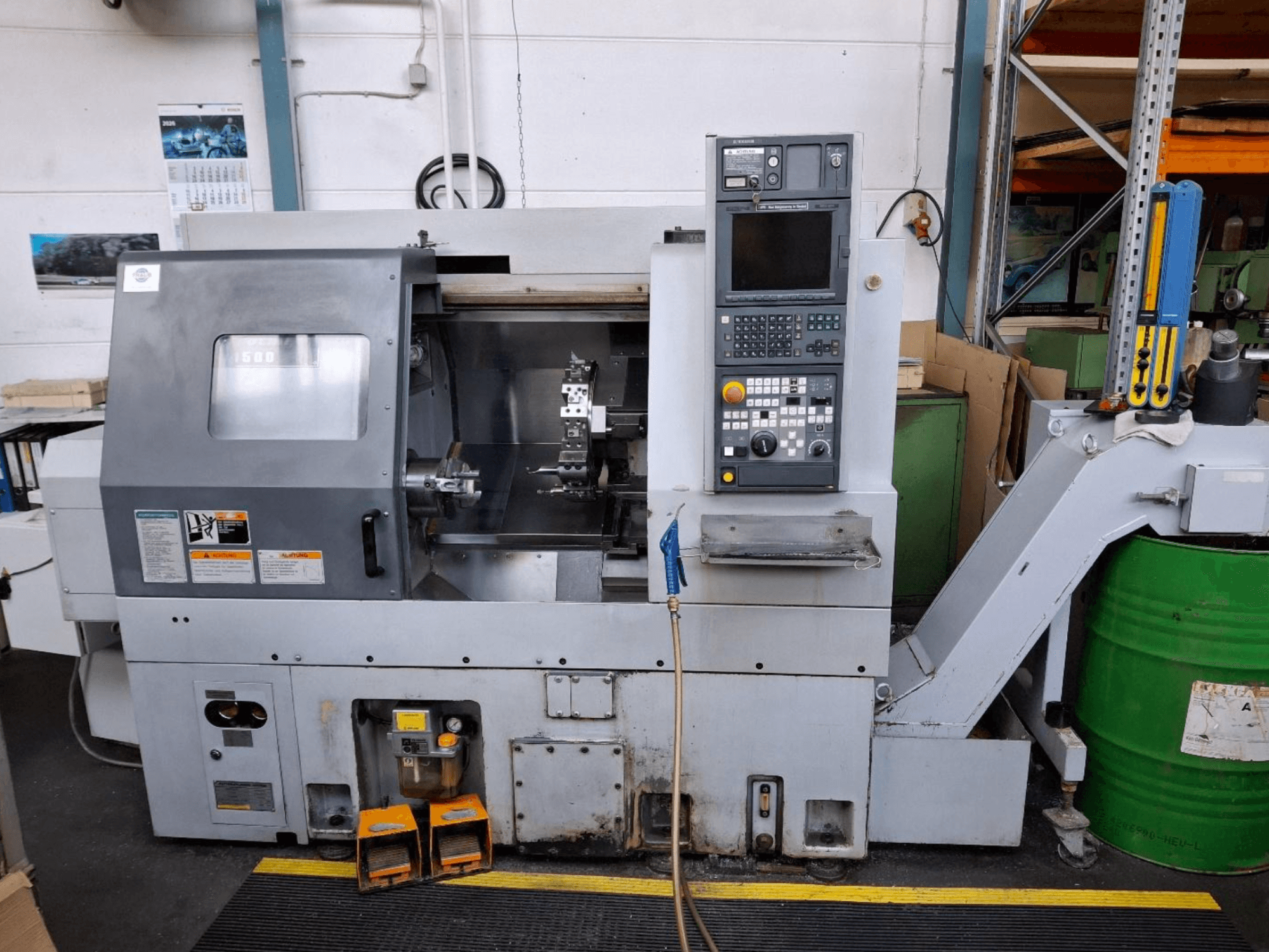 MORI SEIKI CL 1500 T horizontale draaimachine, vooraanzicht met bedieningspaneel, zichtbare gereedschappen en bedieningsdisplay.