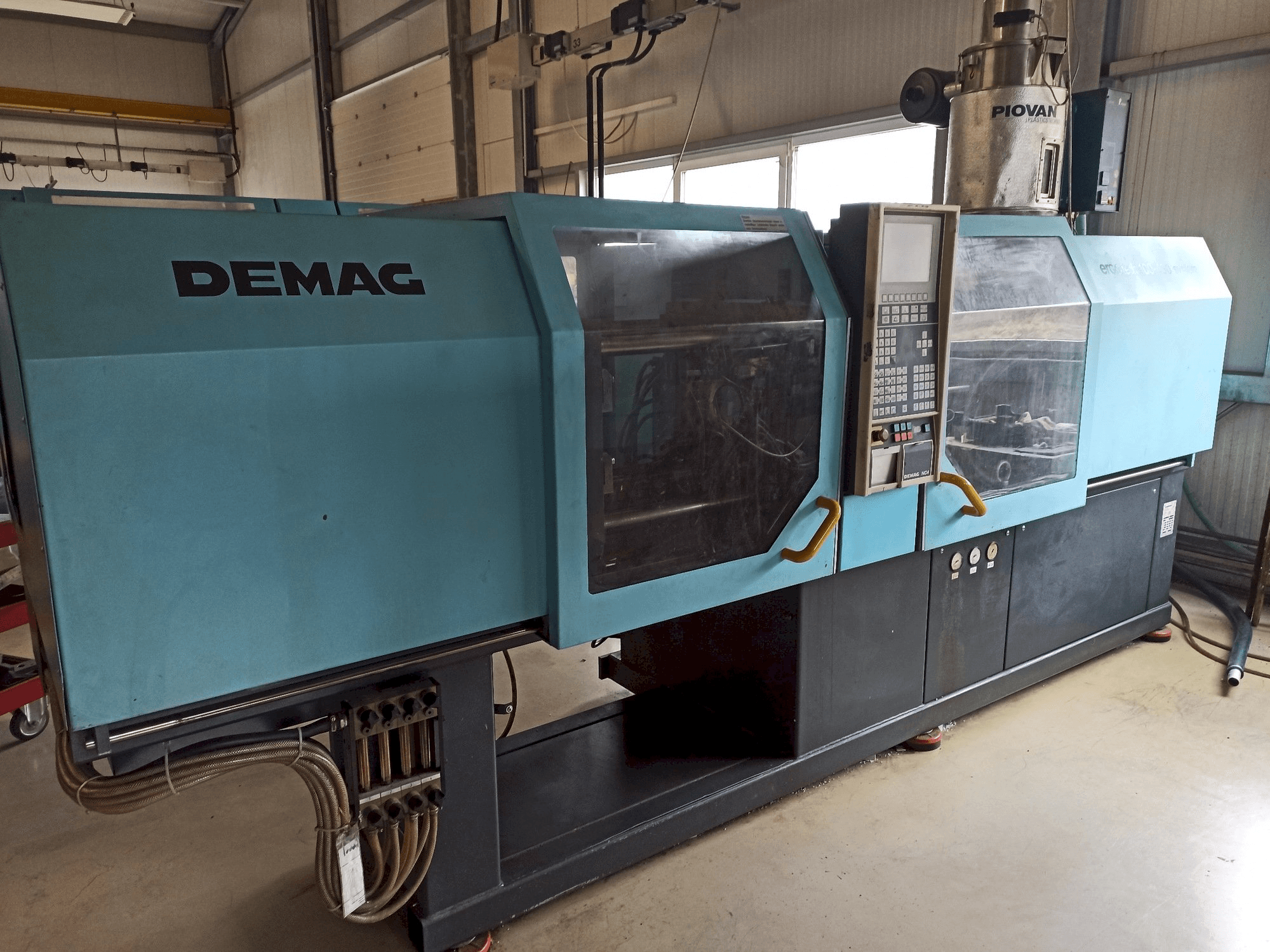 Linkerzijdeaanzicht van DEMAG Ergotech 150-610 Compact machine