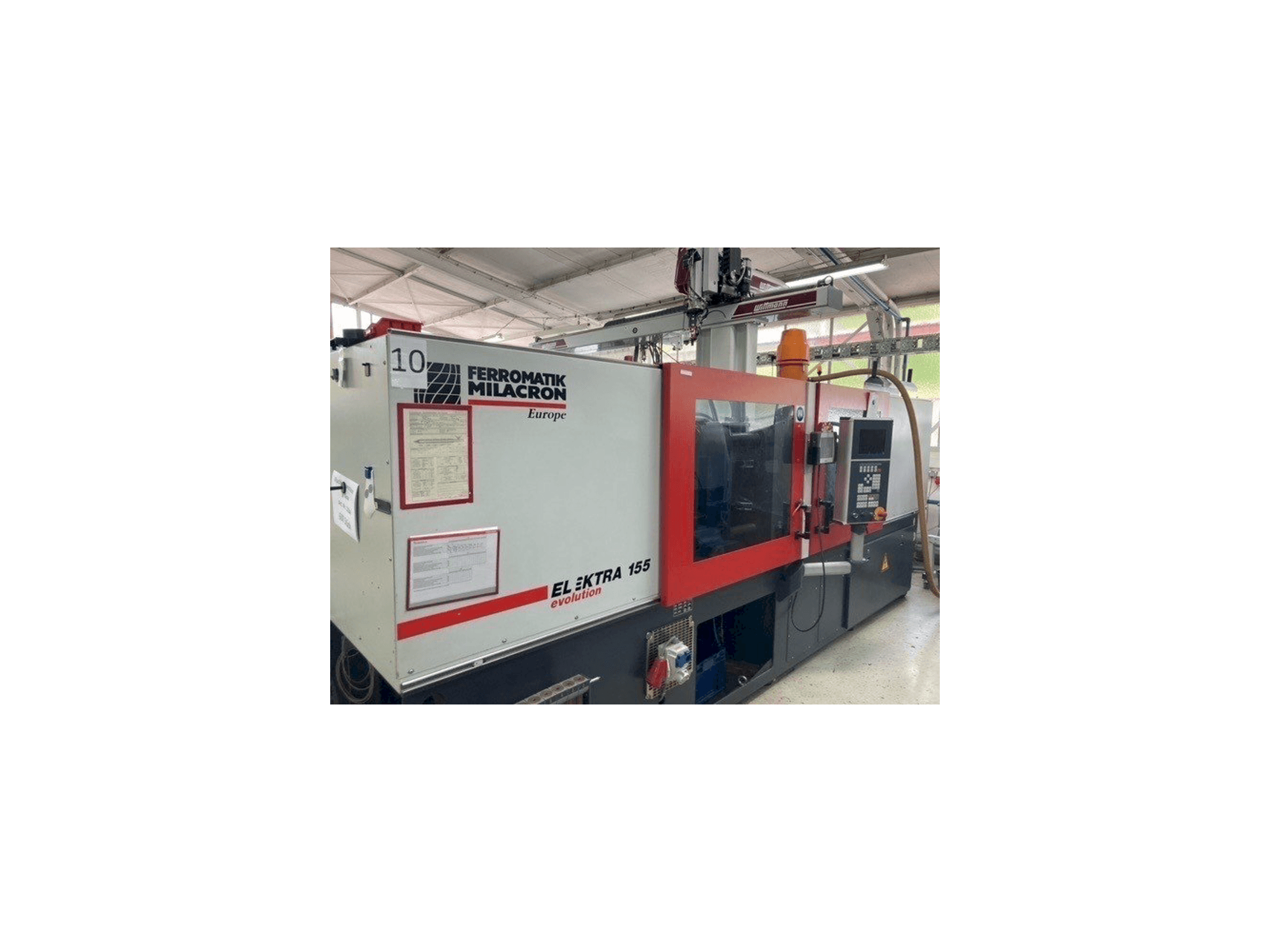 Vooraanzicht van FERROMATIK MILACRON EE 155 machine