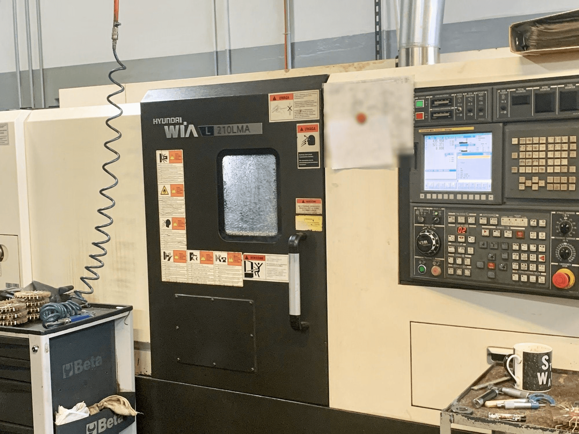 Vooraanzicht van Hyundai Wia L210LMA machine