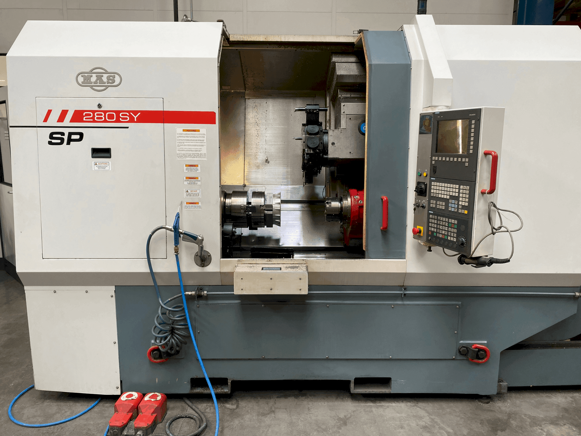 Vooraanzicht van MAS SP280 SY machine