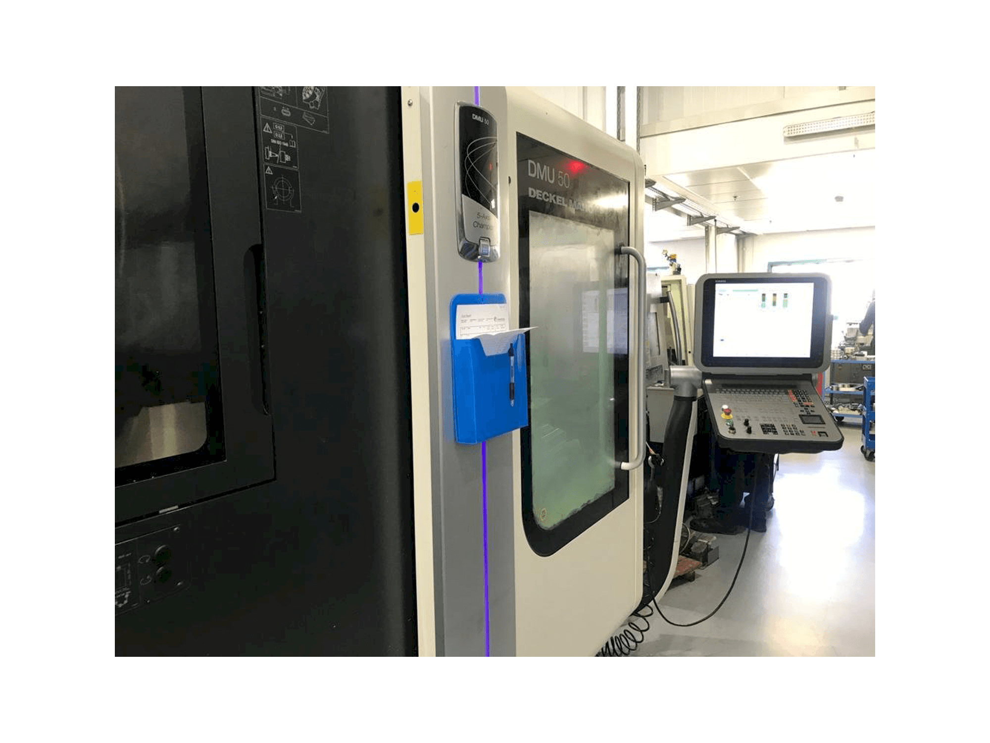 Vooraanzicht van DMG Mori Seiki DMU 50 machine