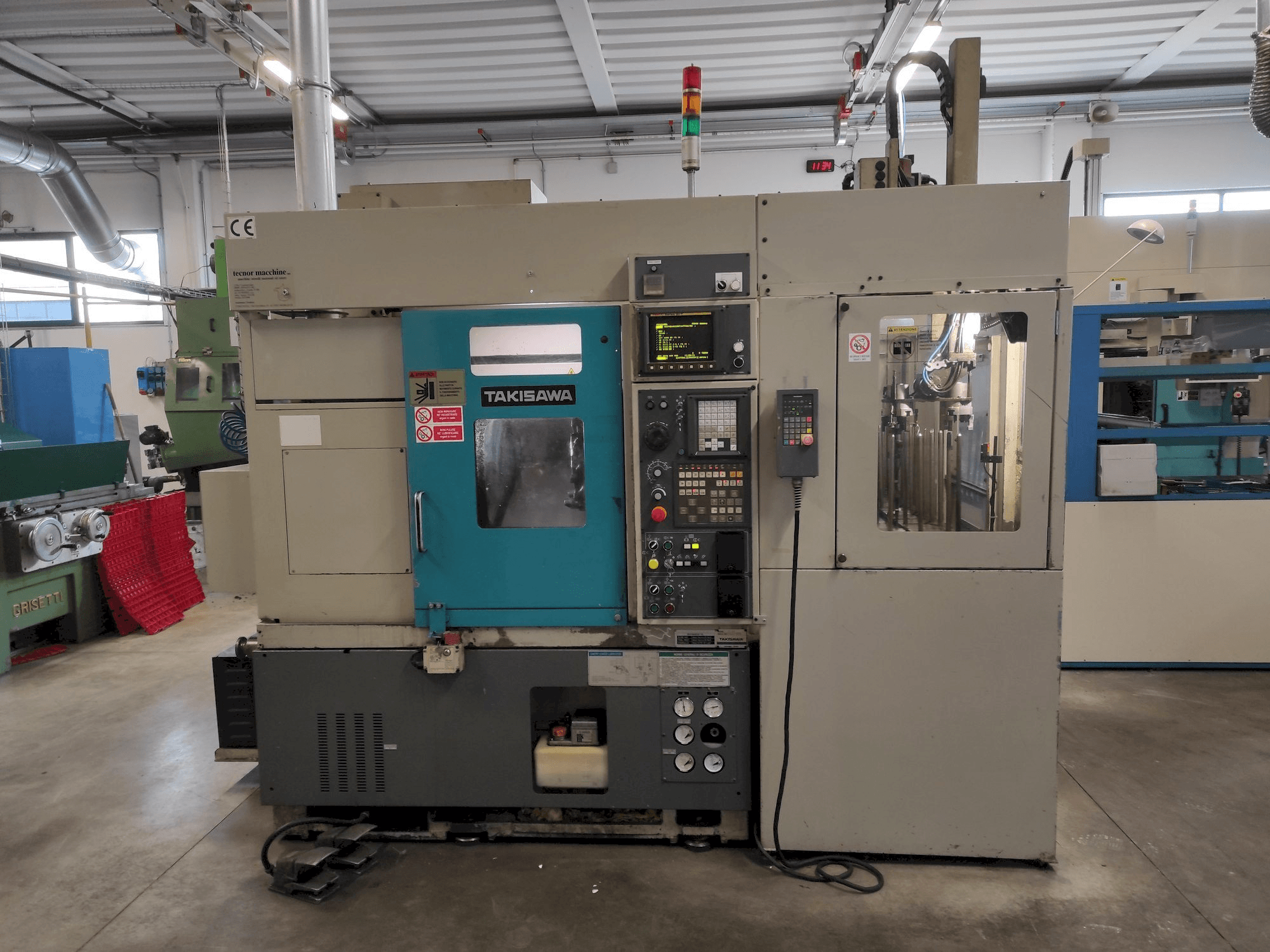 Vooraanzicht van Takisawa TX20 machine