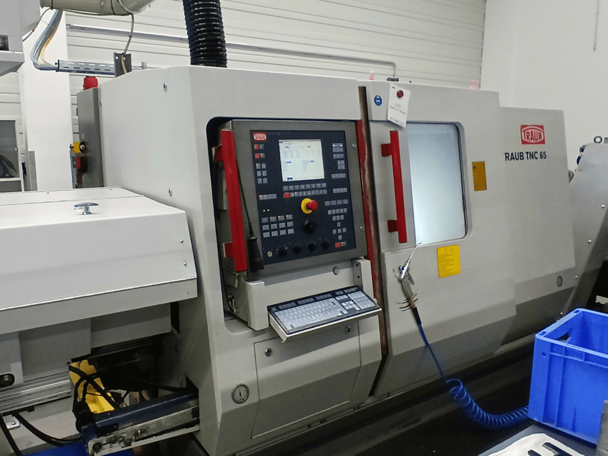 RAUB TNC 65 DG horizontale draaimachine, vooraanzicht, met bedieningspaneel en gereedschapsinterface.