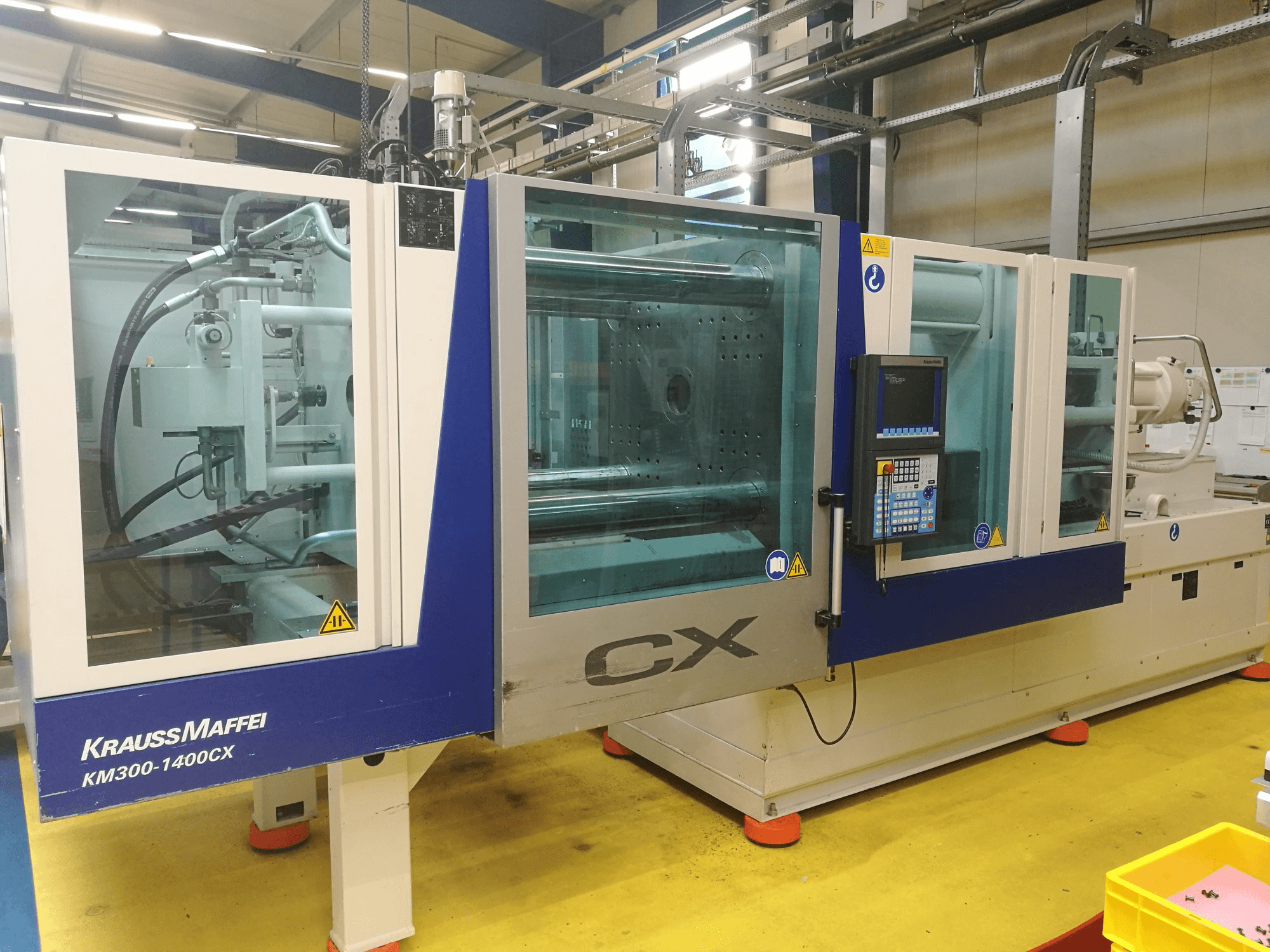 Vooraanzicht van Krauss Maffei 300-1400 CX machine