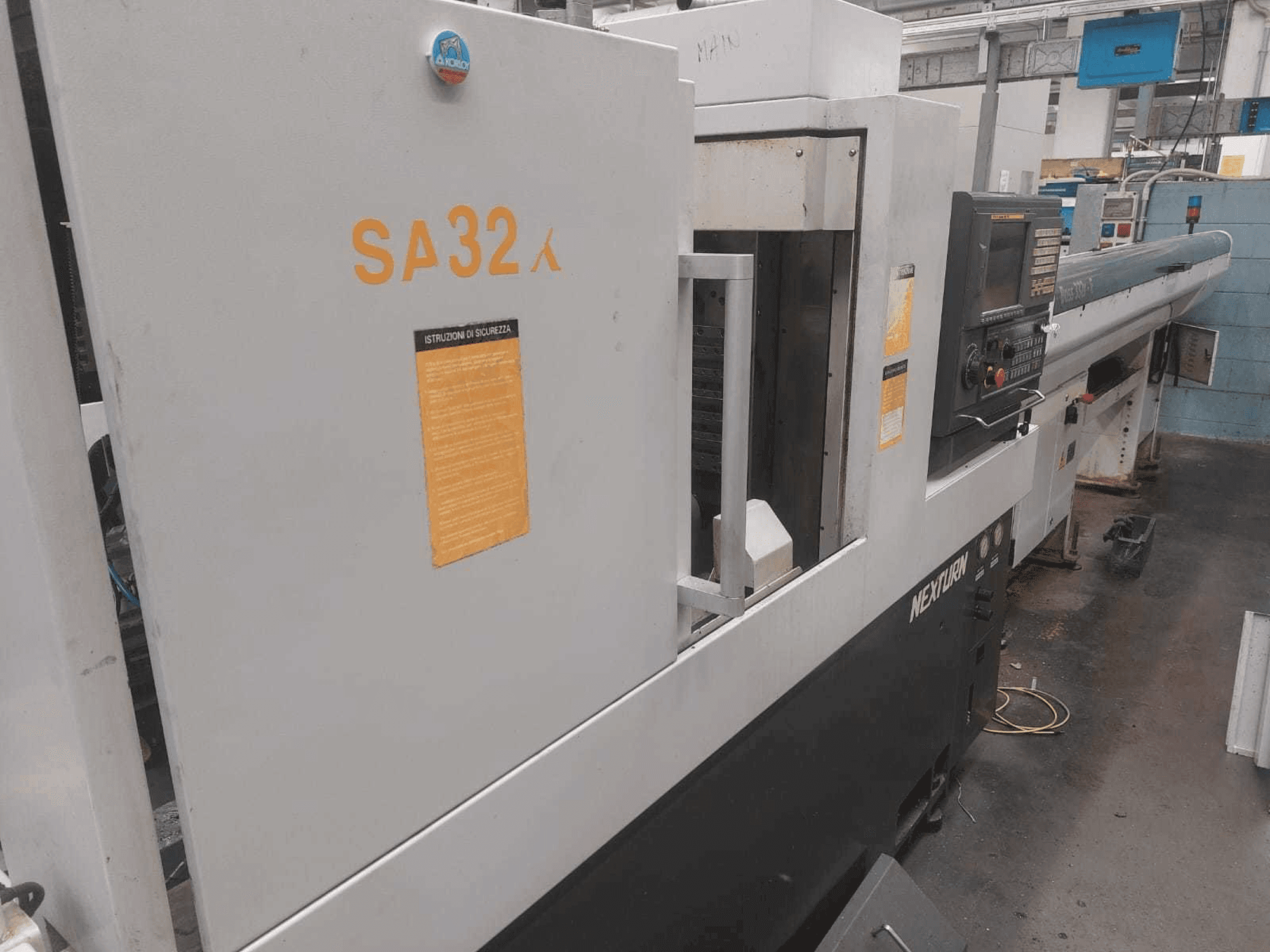 Linkerzijdeaanzicht van Nexturn SA 32X machine