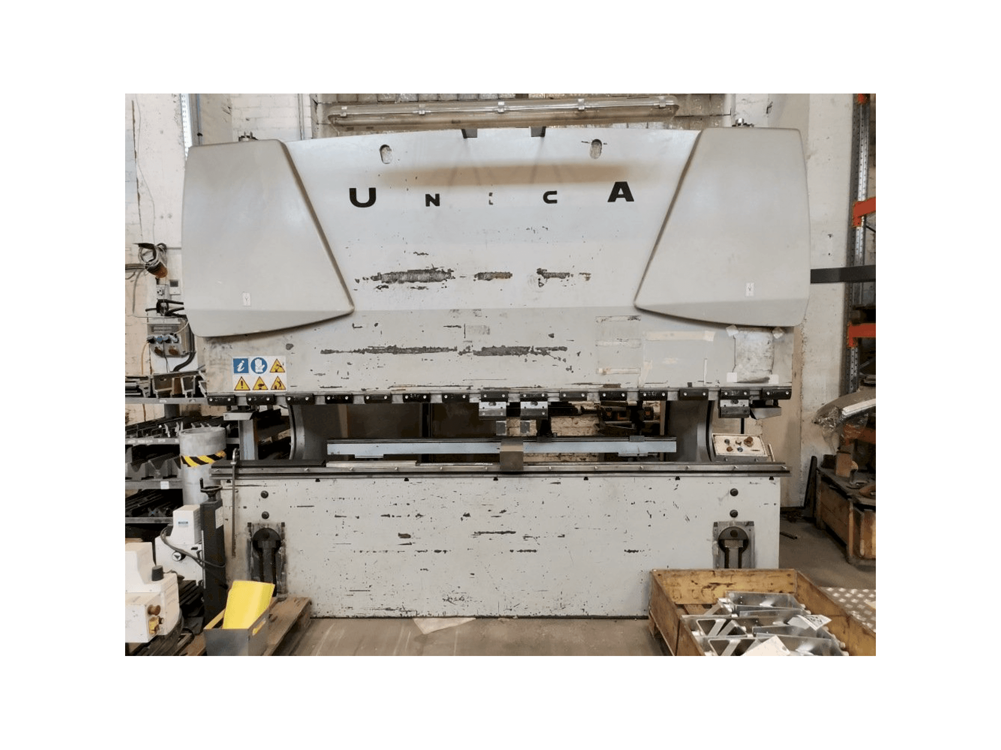 Vooraanzicht van Warcom UNICA30-100 machine