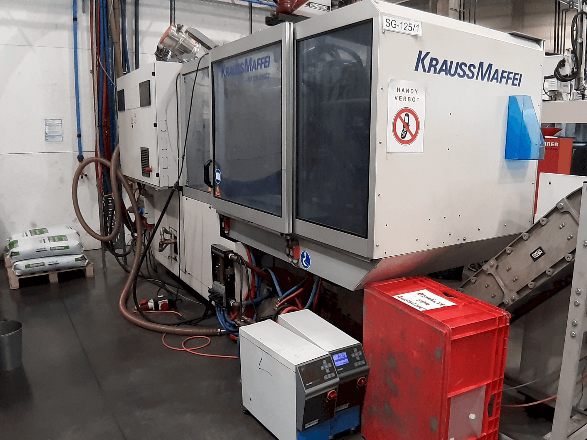 Vooraanzicht van Krauss Maffei 125 - 390 CX machine