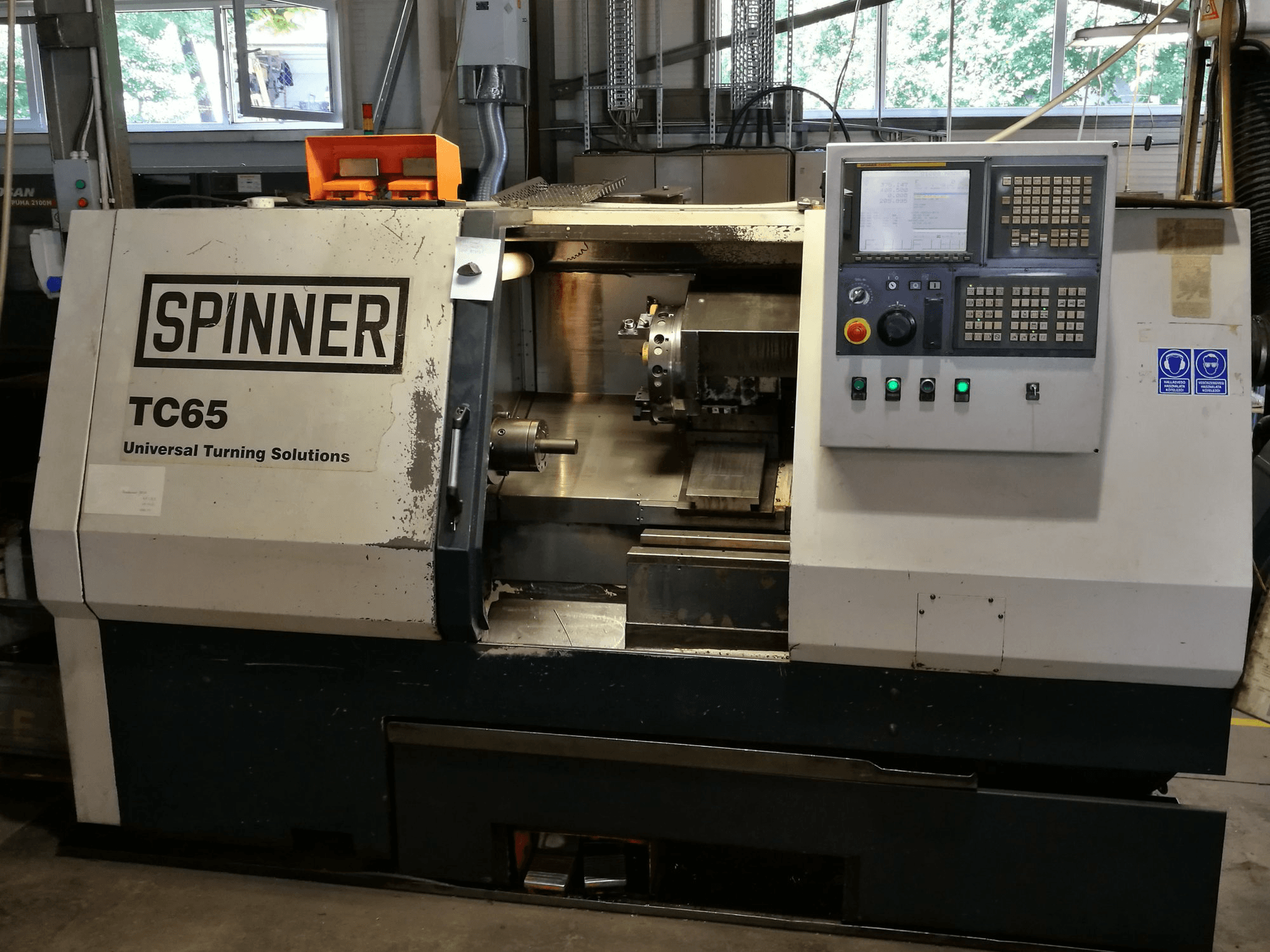Vooraanzicht van SPINNER TC 65 MC machine