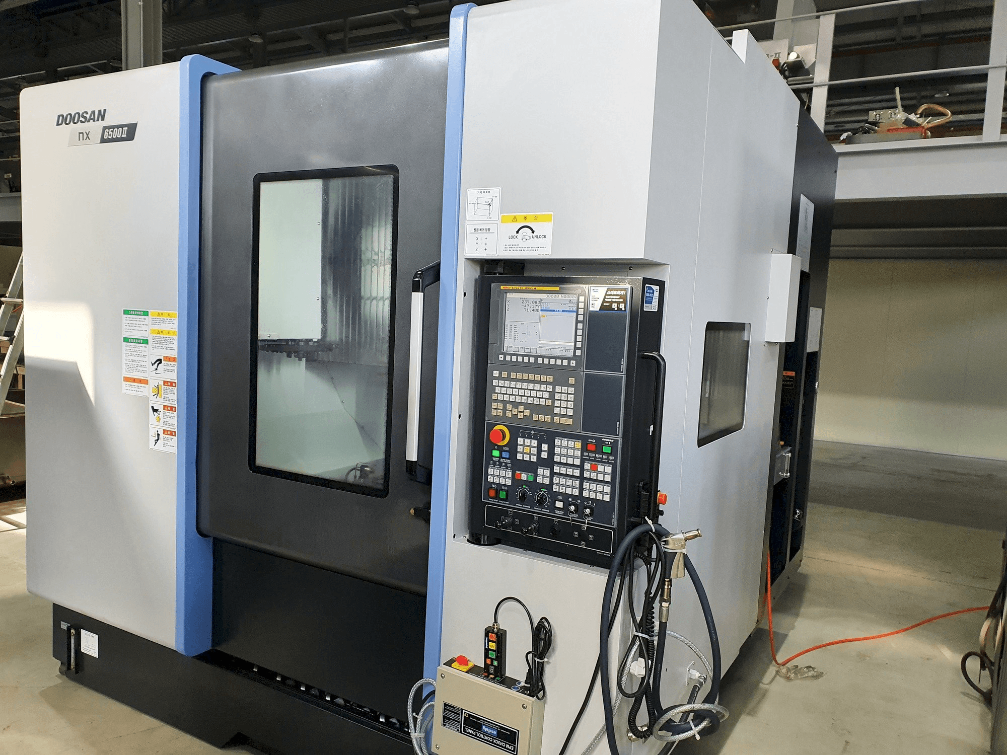 Vooraanzicht van Doosan NX6500Ⅱ machine