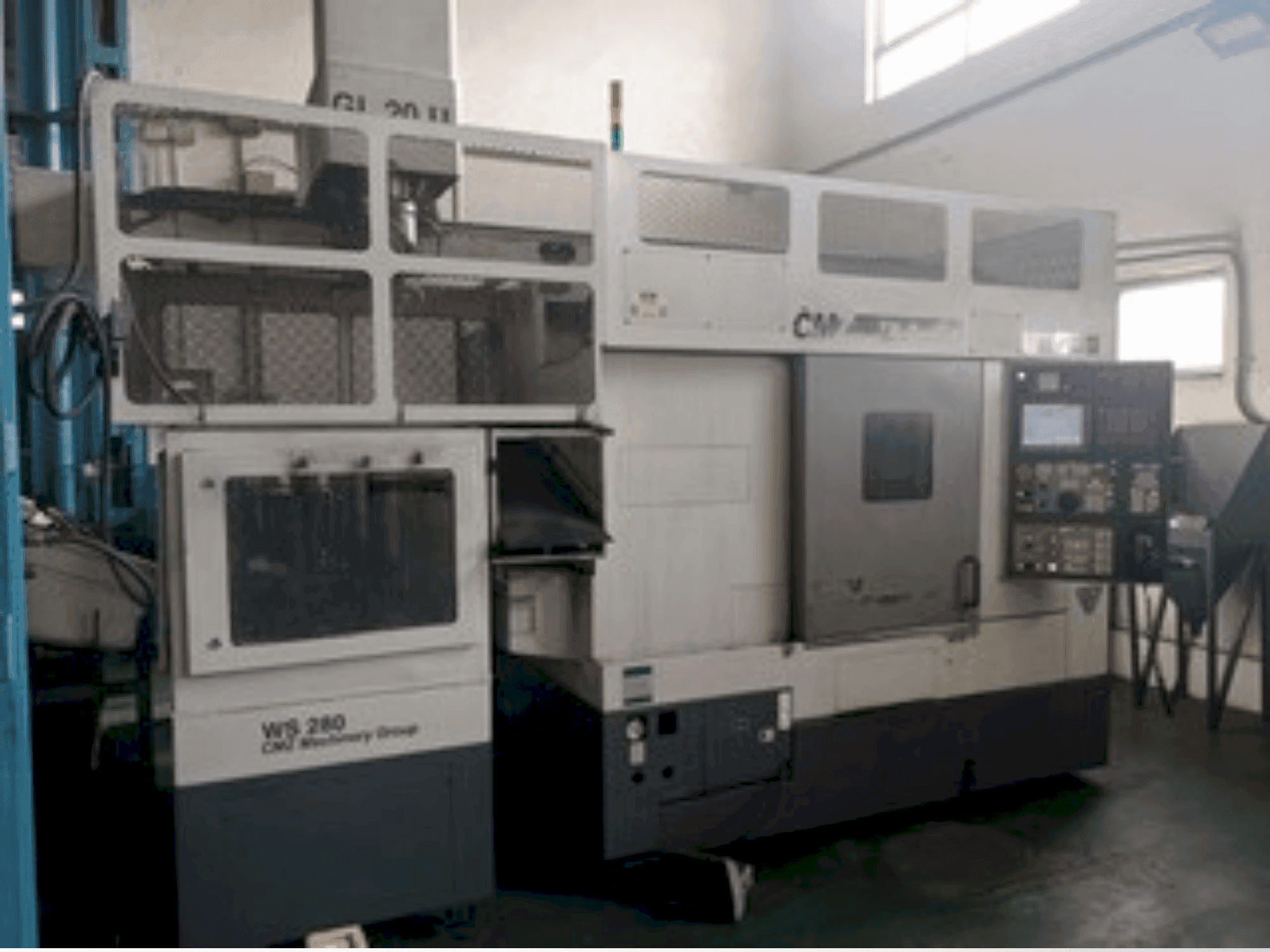 Zijaanzicht van CMZ TA 30-400 machine