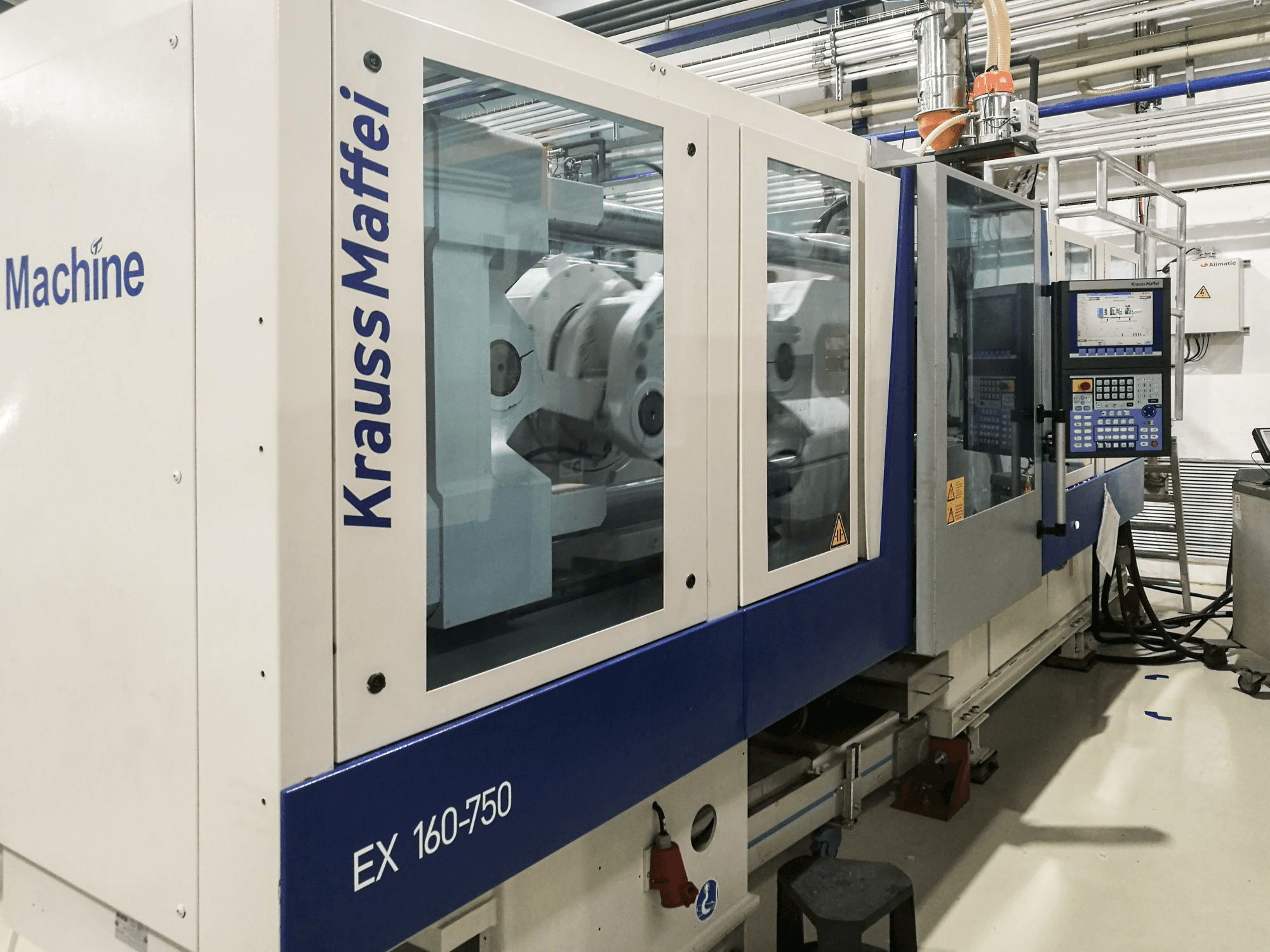 Links zicht van Krauss Maffei 160-750 EX machine