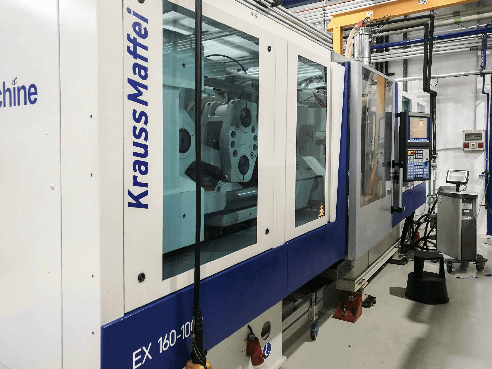 Links zicht van Krauss Maffei 160-1000 EX machine