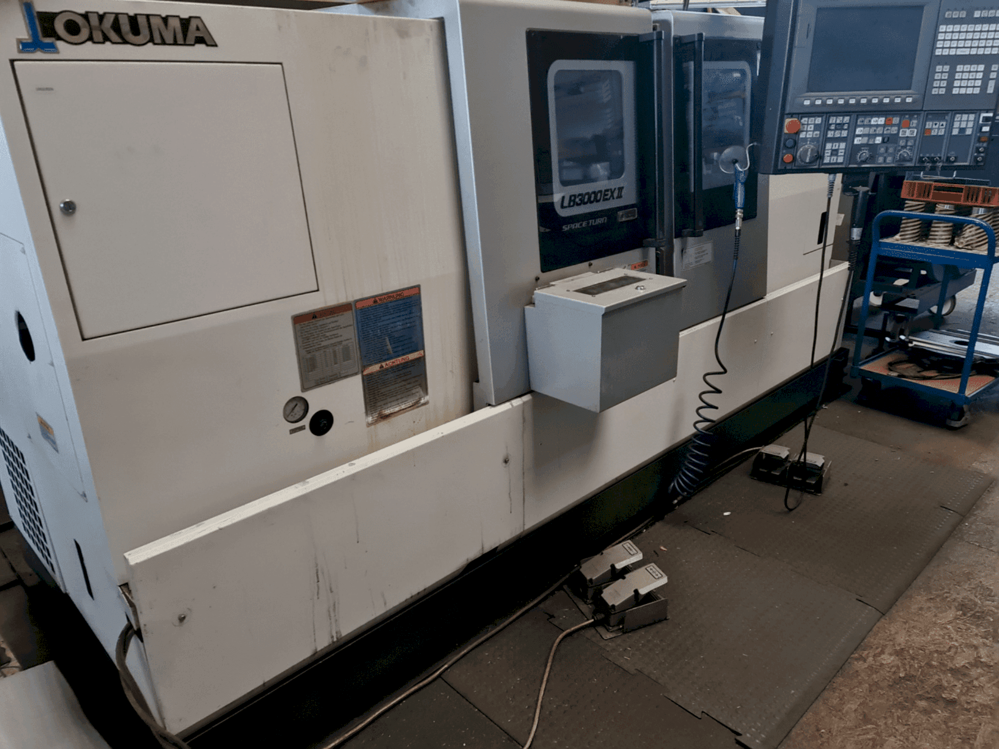 Vooraanzicht van Okuma LB3000 EX II machine