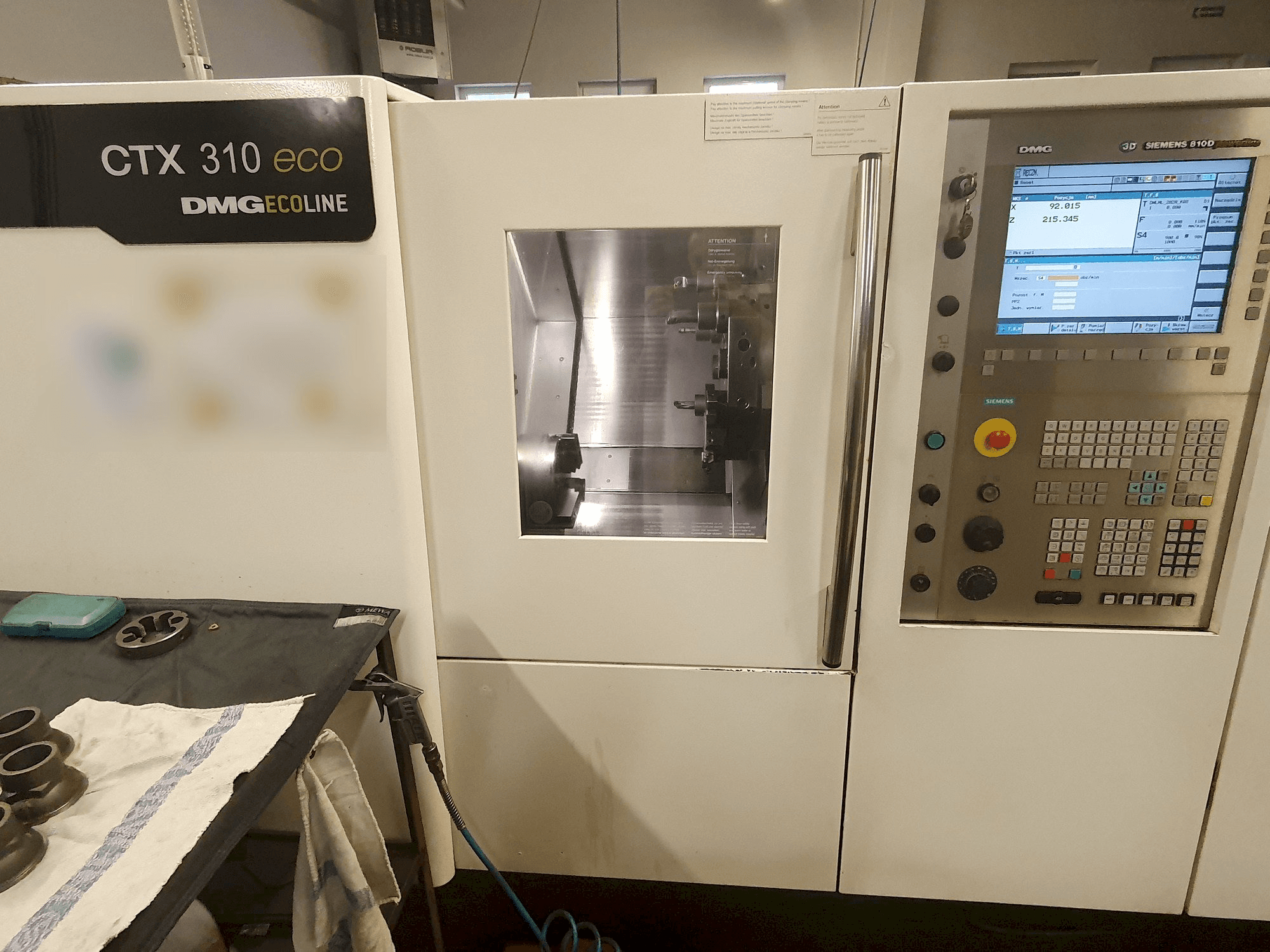 Vooraanzicht van DMG GILDEMEISTER ecoline CTX 310 eco V3 machine