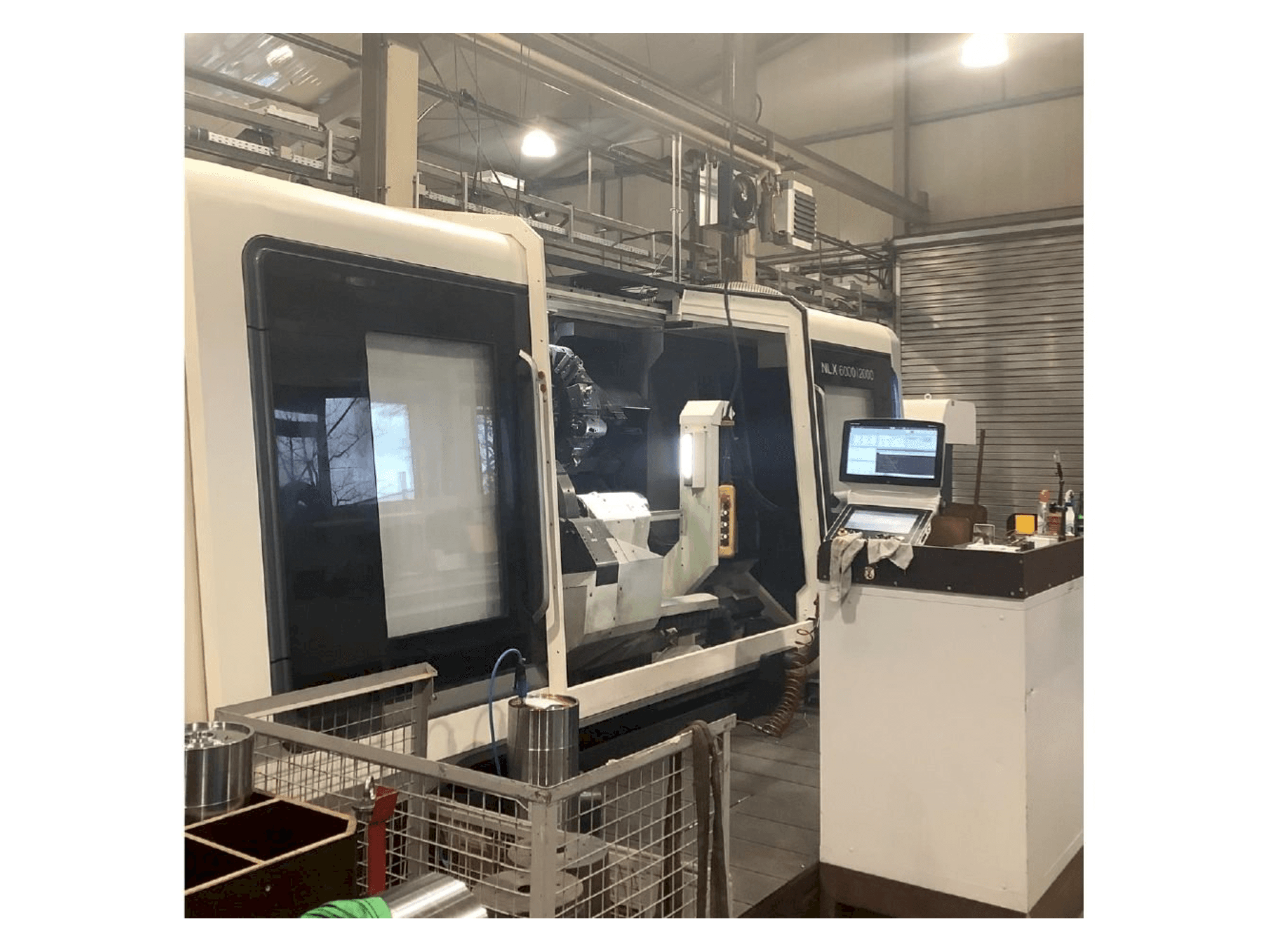 Vooraanzicht van DMG MORI NLX 6000 | 2000 machine