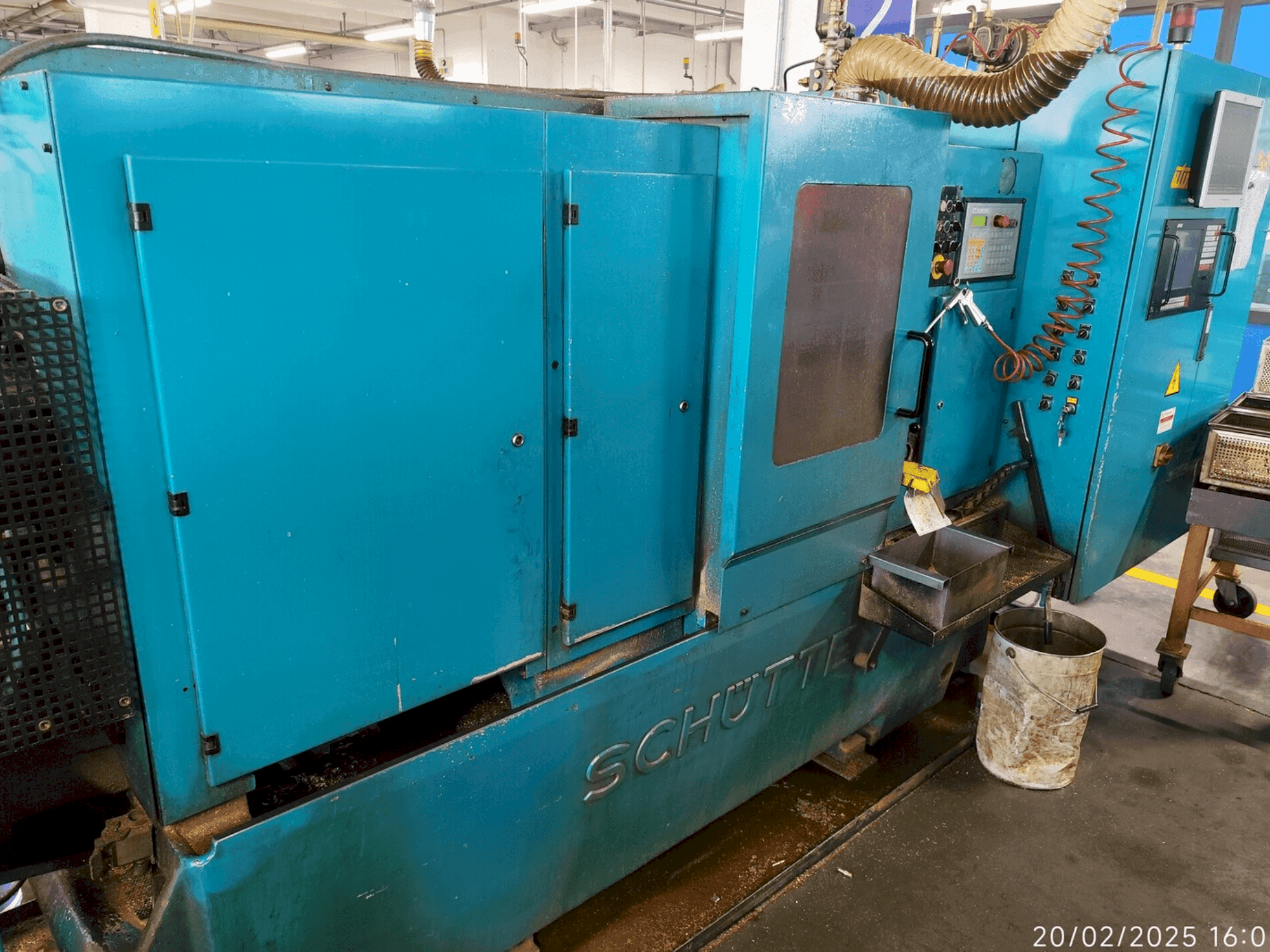 Vooraanzicht van Schütte SE16 machine