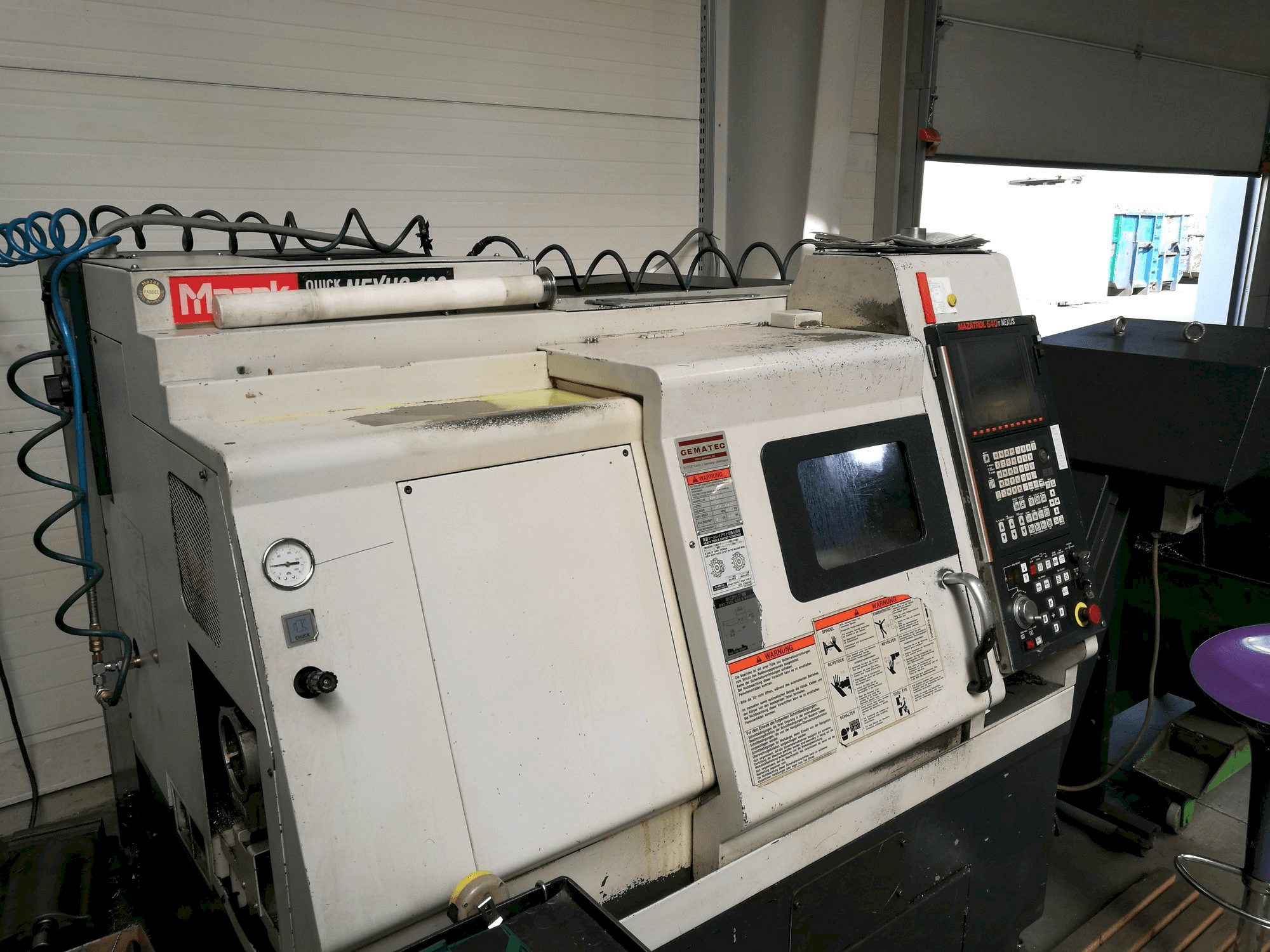 Linkerzijdeaanzicht van Mazak QT NEXUS 100 machine