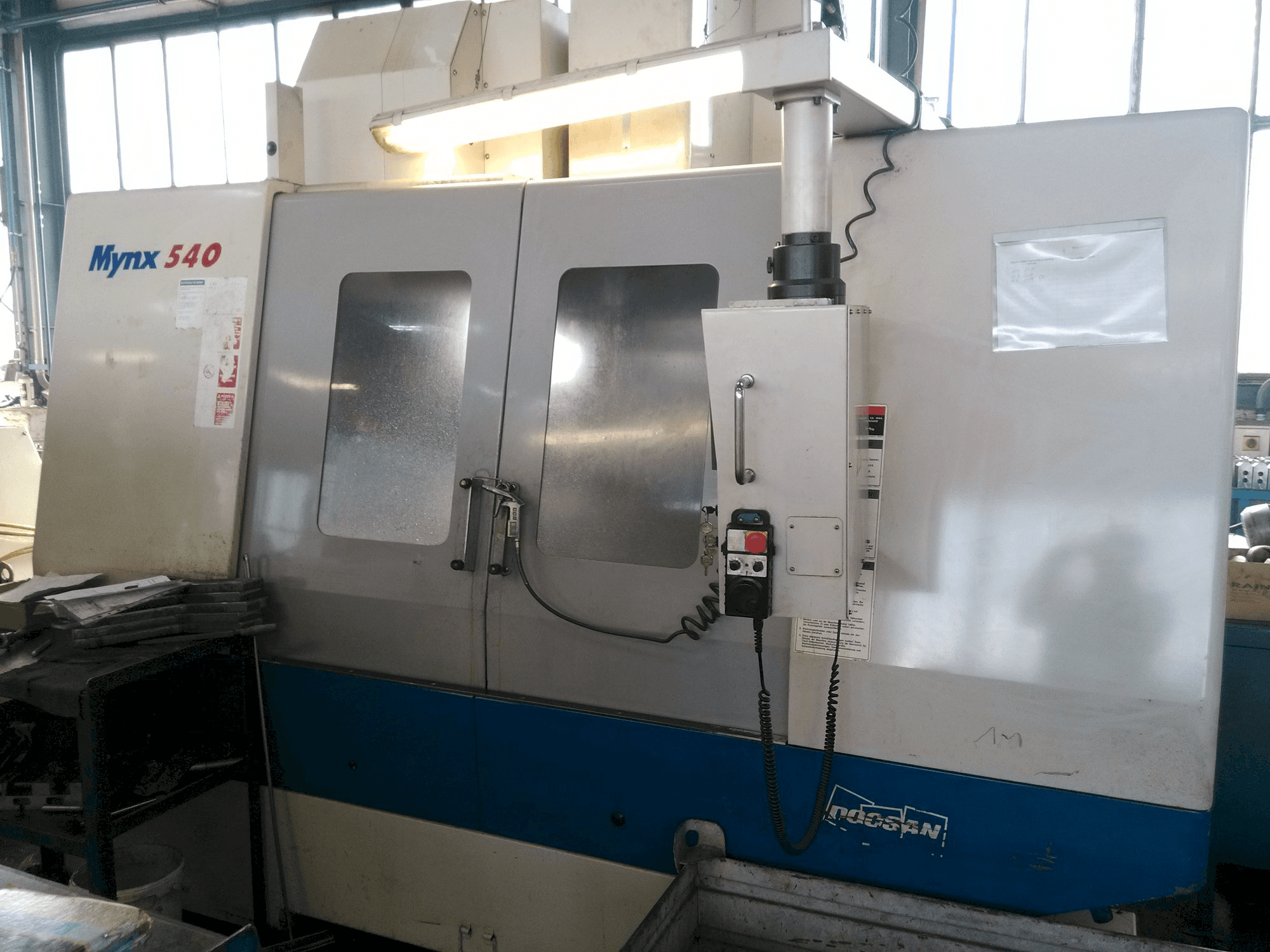 Vooraanzicht van Doosan Mynx 540 machine