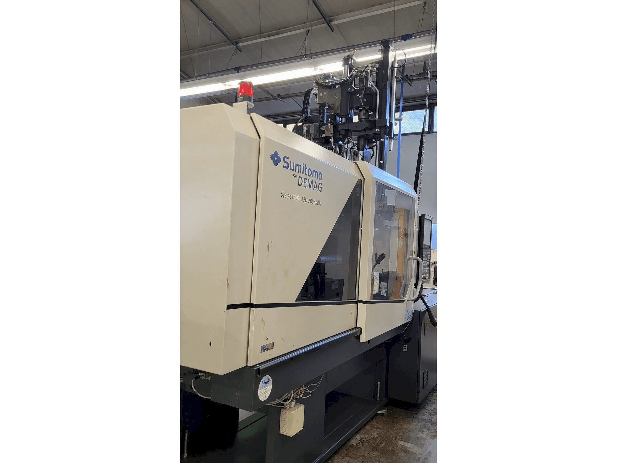 Linkerzijdeaanzicht van Sumitomo SHI DEMAG Systec Multi 120/470-200h/80V machine