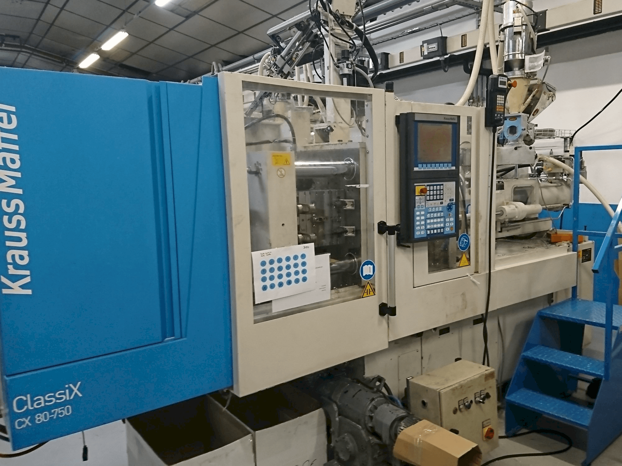 Vooraanzicht van Krauss Maffei 80-750 CX machine